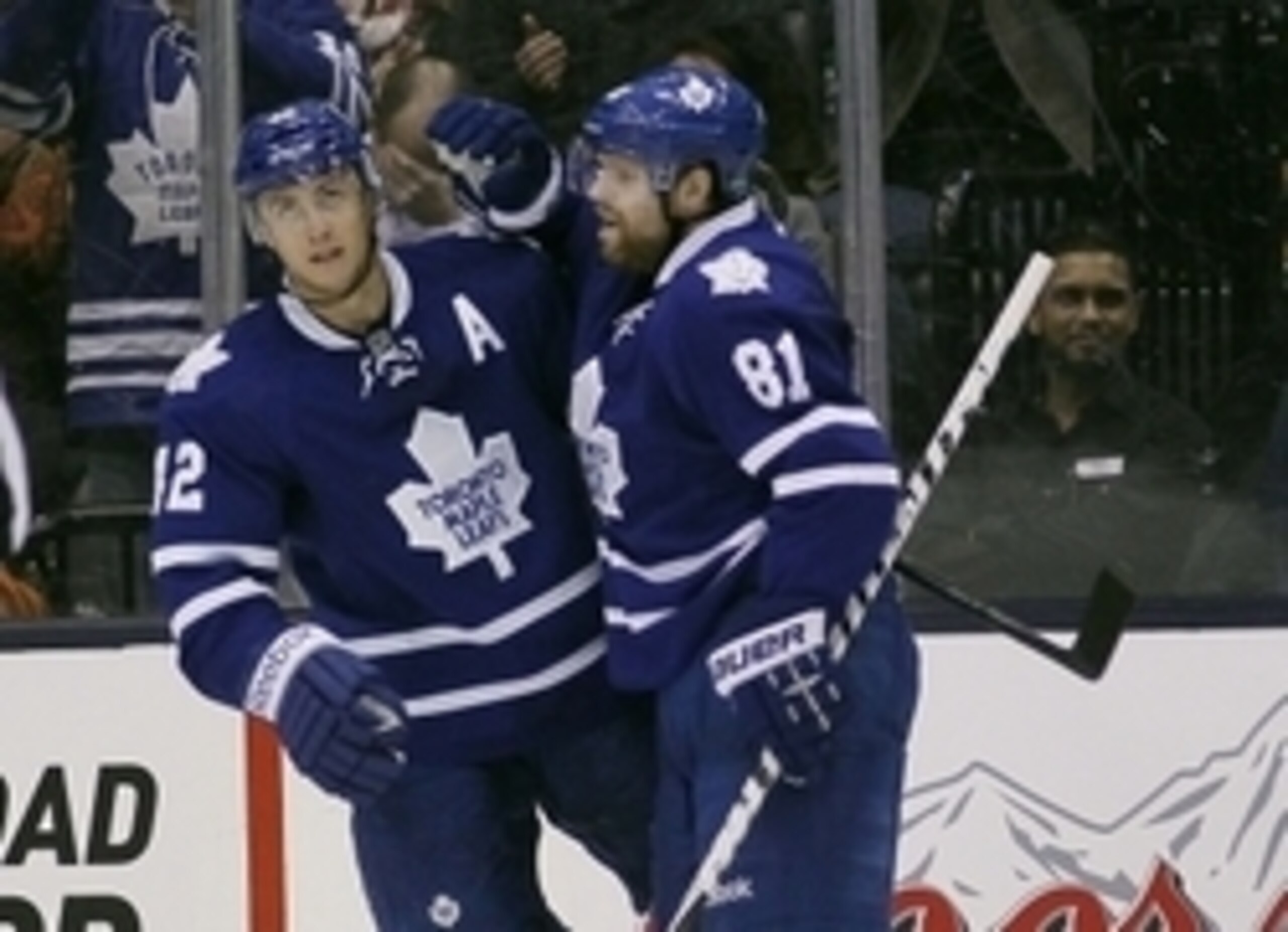 Tyler Bozak celebrates a goal with Phil Kessel.