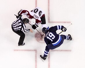 Ryan O'Reilly takes a faceoff against the Winnipeg Jets.