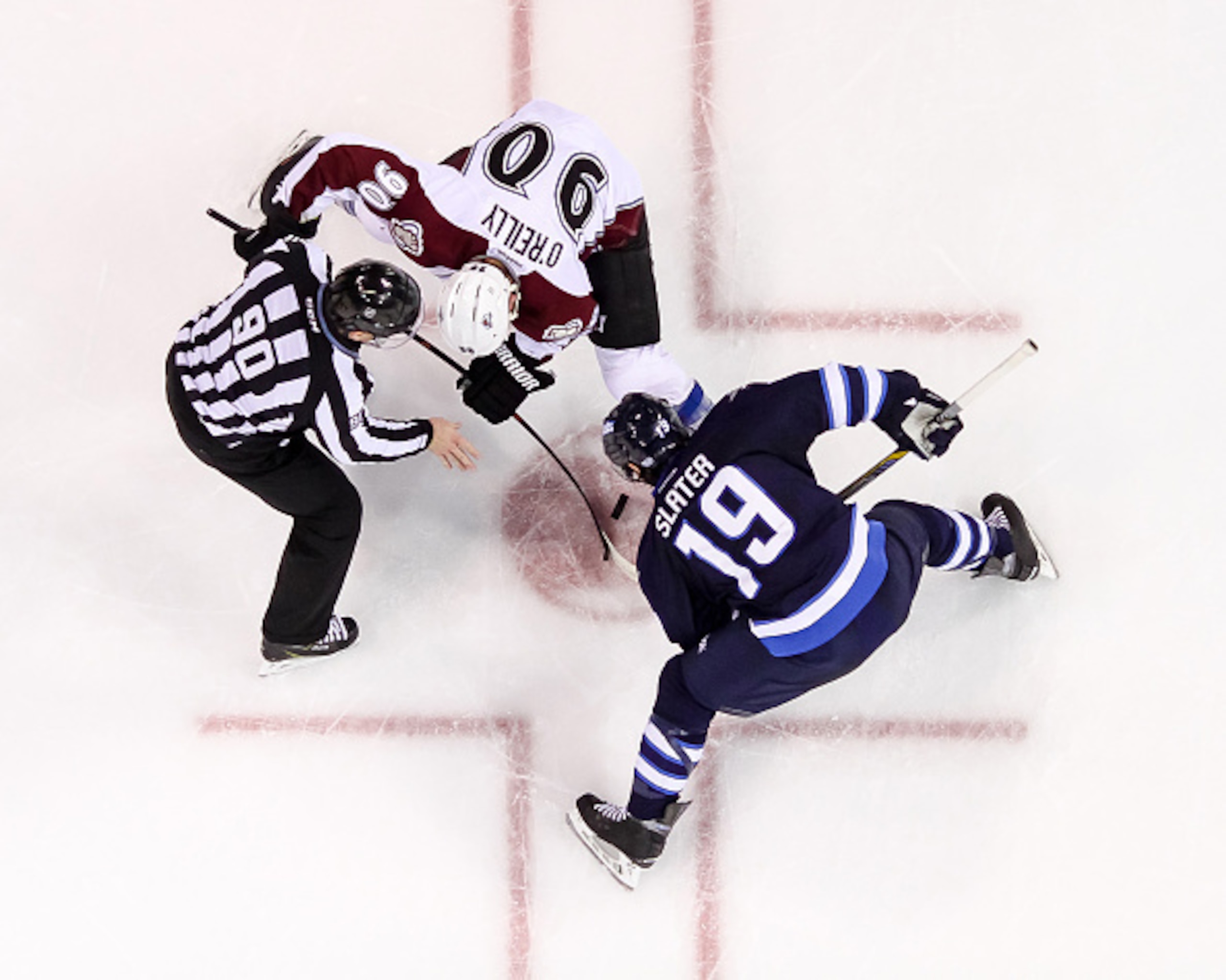Ryan O'Reilly takes a faceoff against the Winnipeg Jets.