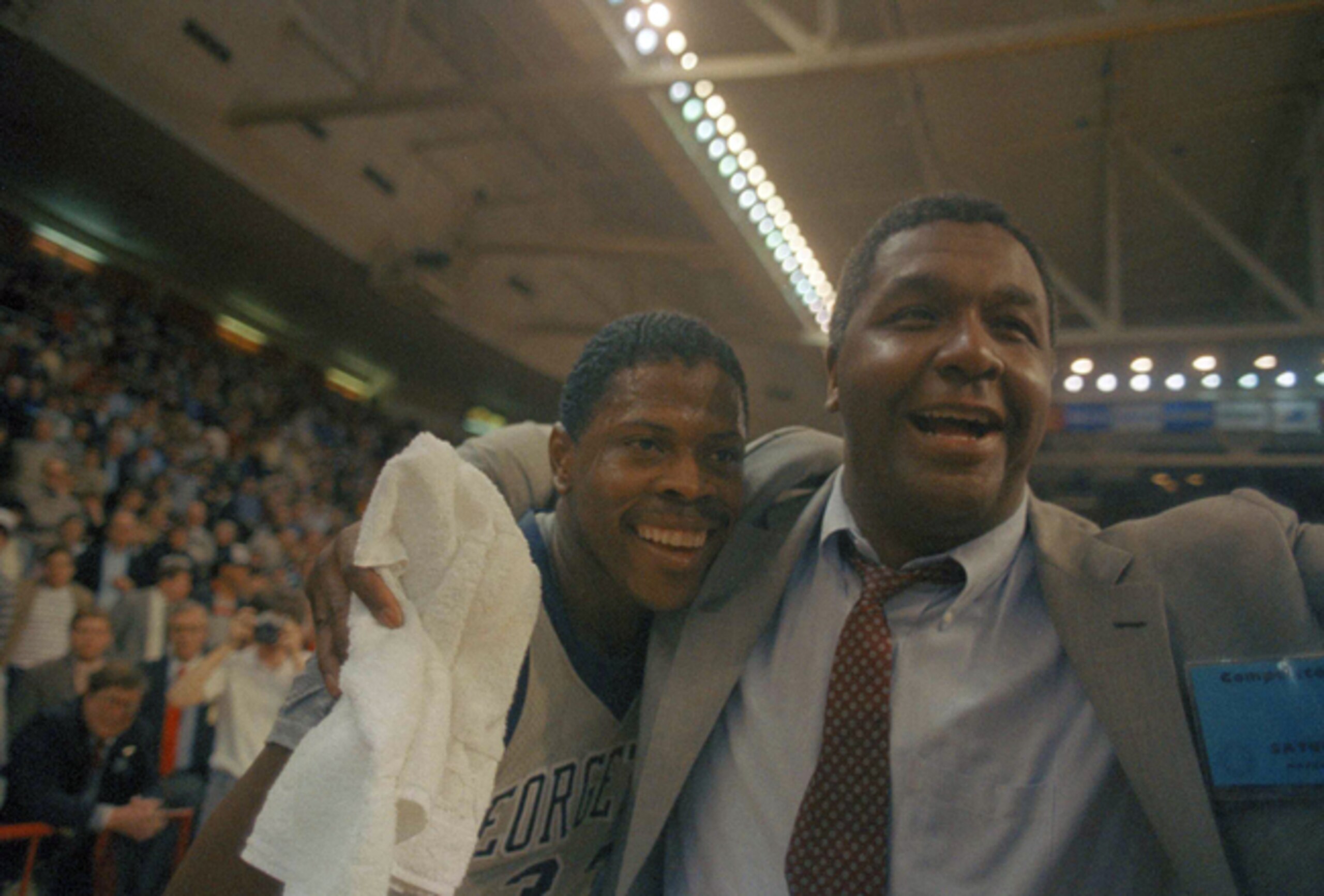Shortly after earning these smiles in the 1985 NCAA tournament, Patrick Ewing (left) and coach John Thompson were not so happy. Shortly after earning these smiles in the 1985 NCAA tournament, Patrick Ewing (left) and coach John Thompson were not so happy.