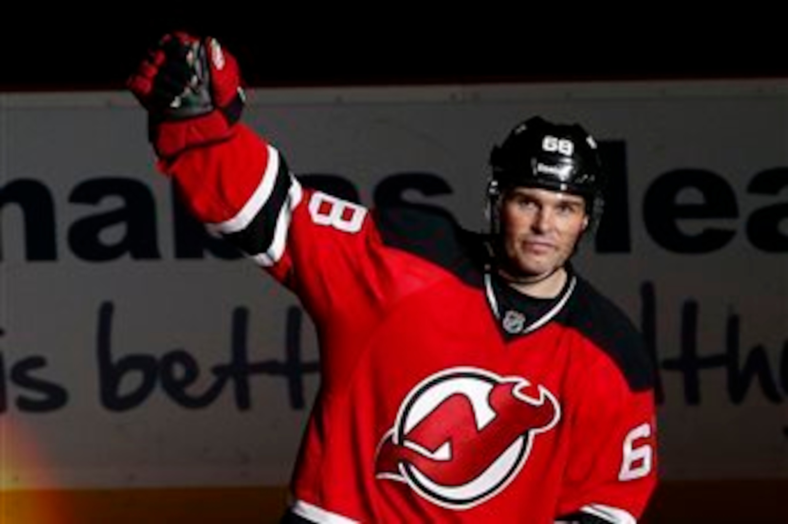 Jaromir Jagr takes a bow after being named the first star of a game against the Philadelphia Flyers in which he scored a hat trick.