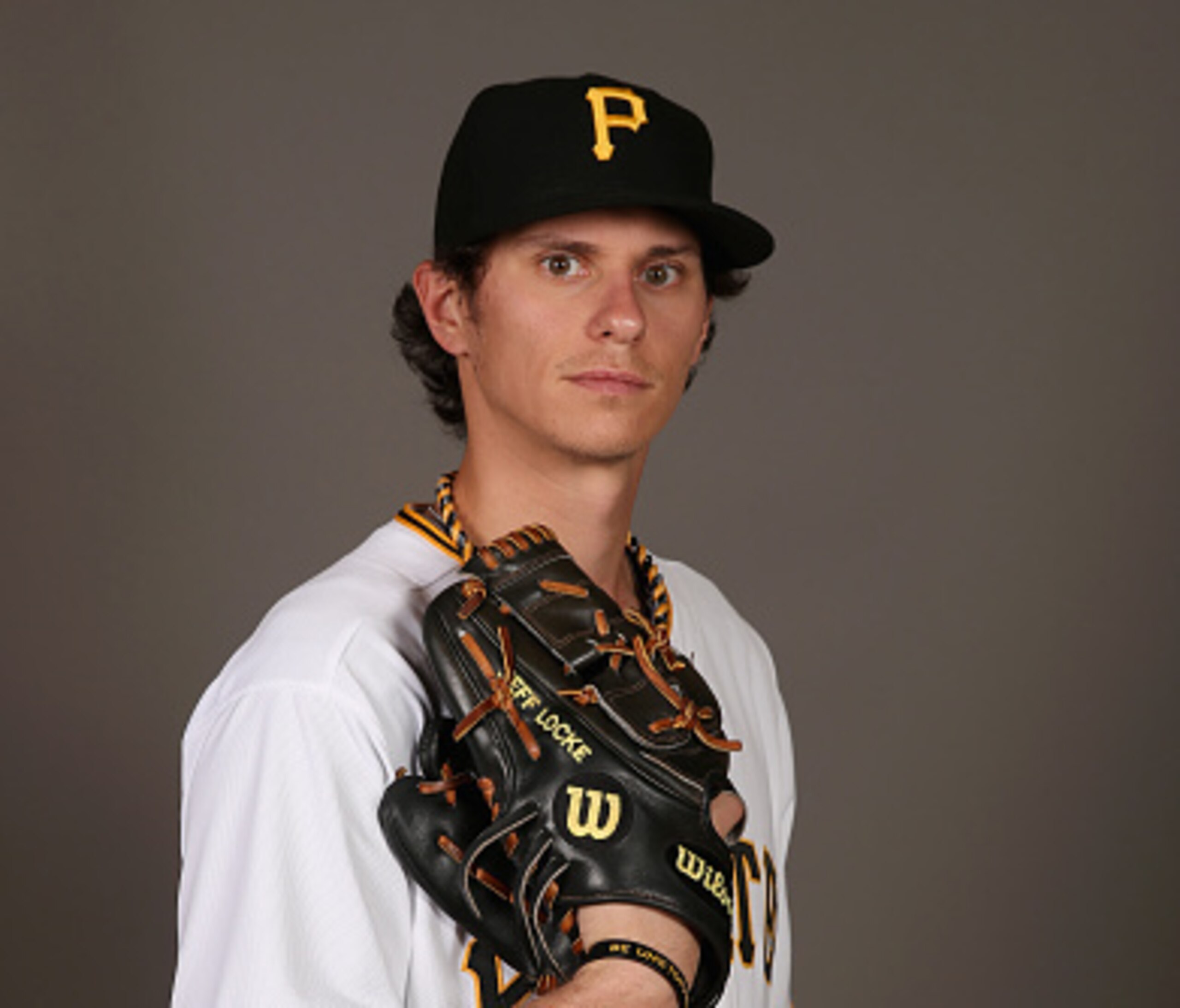 BRADENTON, FL - FEBRUARY 26:  Pitcher Jeff Locke #49 of the Pittsburgh Pirates poses for a portrait on photo day on February 26, 2015 at Pirate City in Bradenton, Florida.  (Photo by Rob Carr/Getty Images)