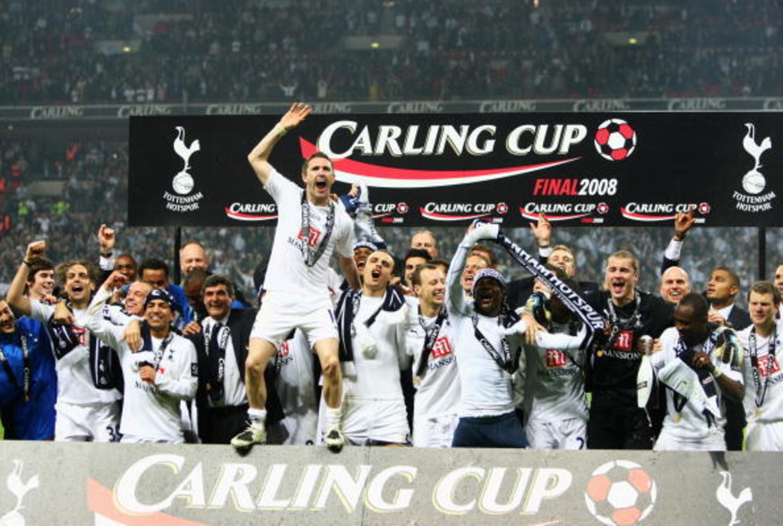 LONDON - FEBRUARY 24: Robbie Keane of Tottenham Hotspur leads the celebrations following victory during the Carling Cup Final between Tottenham Hotspur and Chelsea at Wembley Stadium on February 24, 2008 in London, England. Tottenham Hotspur won 2-1 afte LONDON - FEBRUARY 24: Robbie Keane of Tottenham Hotspur leads the celebrations following victory during the Carling Cup Final between Tottenham Hotspur and Chelsea at Wembley Stadium on February 24, 2008 in London, England. Tottenham Hotspur won 2-1 afte