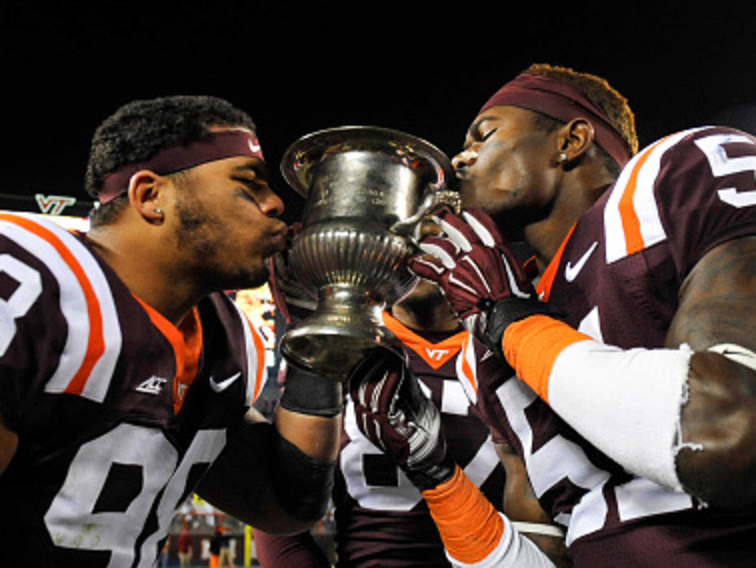 The Hokies celebrating another year of possession of the Commonwealth Cup The Hokies celebrating another year of possession of the Commonwealth Cup