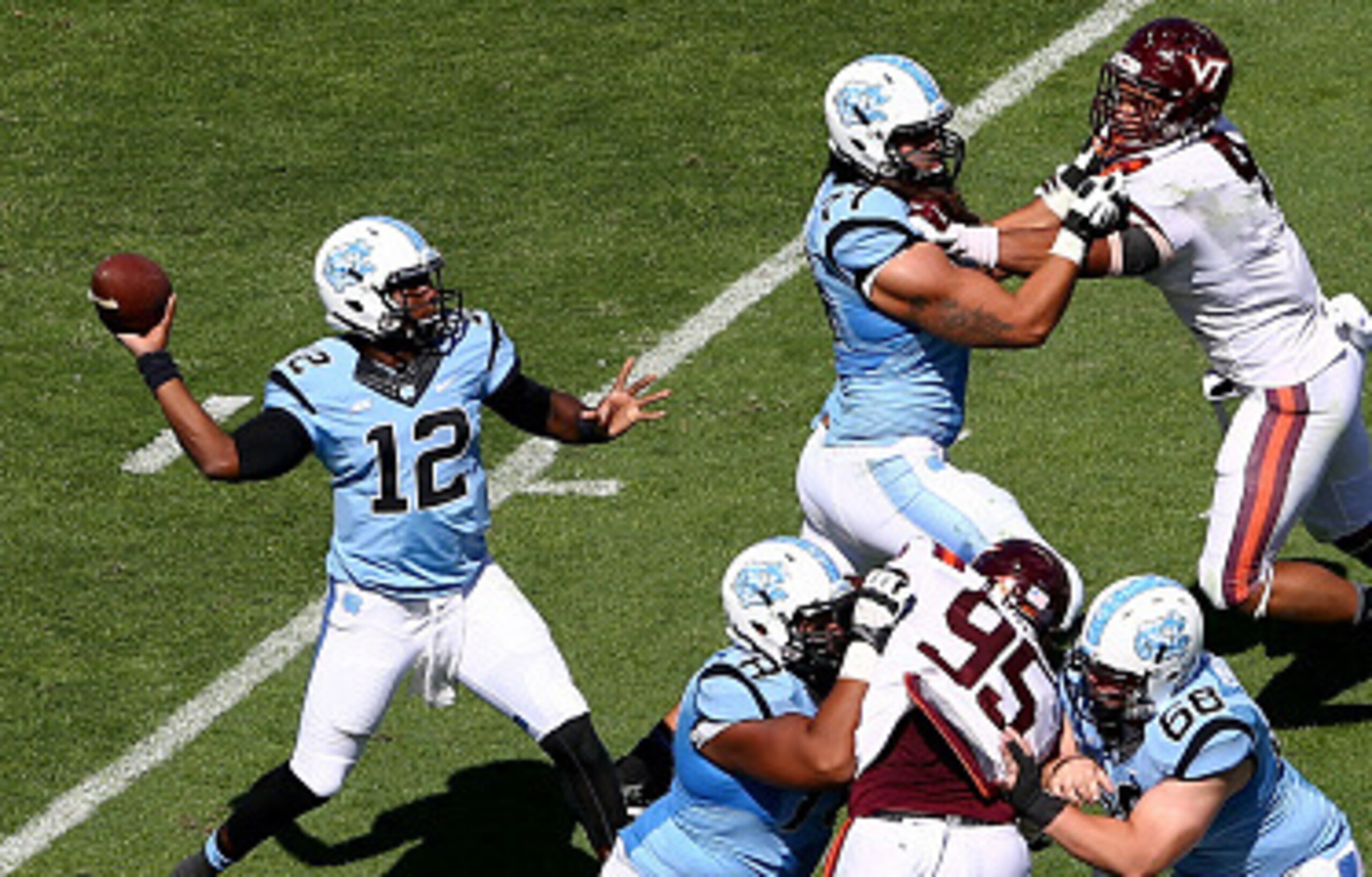 CHAPEL HILL, NC - OCTOBER 04: Marquise Williams #12 of the North Carolina Tar Heels drops back to pass against the Virginia Tech Hokies during their game at Kenan Stadium on October 4, 2014 in Chapel Hill, North Carolina. (Photo by Streeter Lecka/Getty CHAPEL HILL, NC - OCTOBER 04: Marquise Williams #12 of the North Carolina Tar Heels drops back to pass against the Virginia Tech Hokies during their game at Kenan Stadium on October 4, 2014 in Chapel Hill, North Carolina. (Photo by Streeter Lecka/Getty