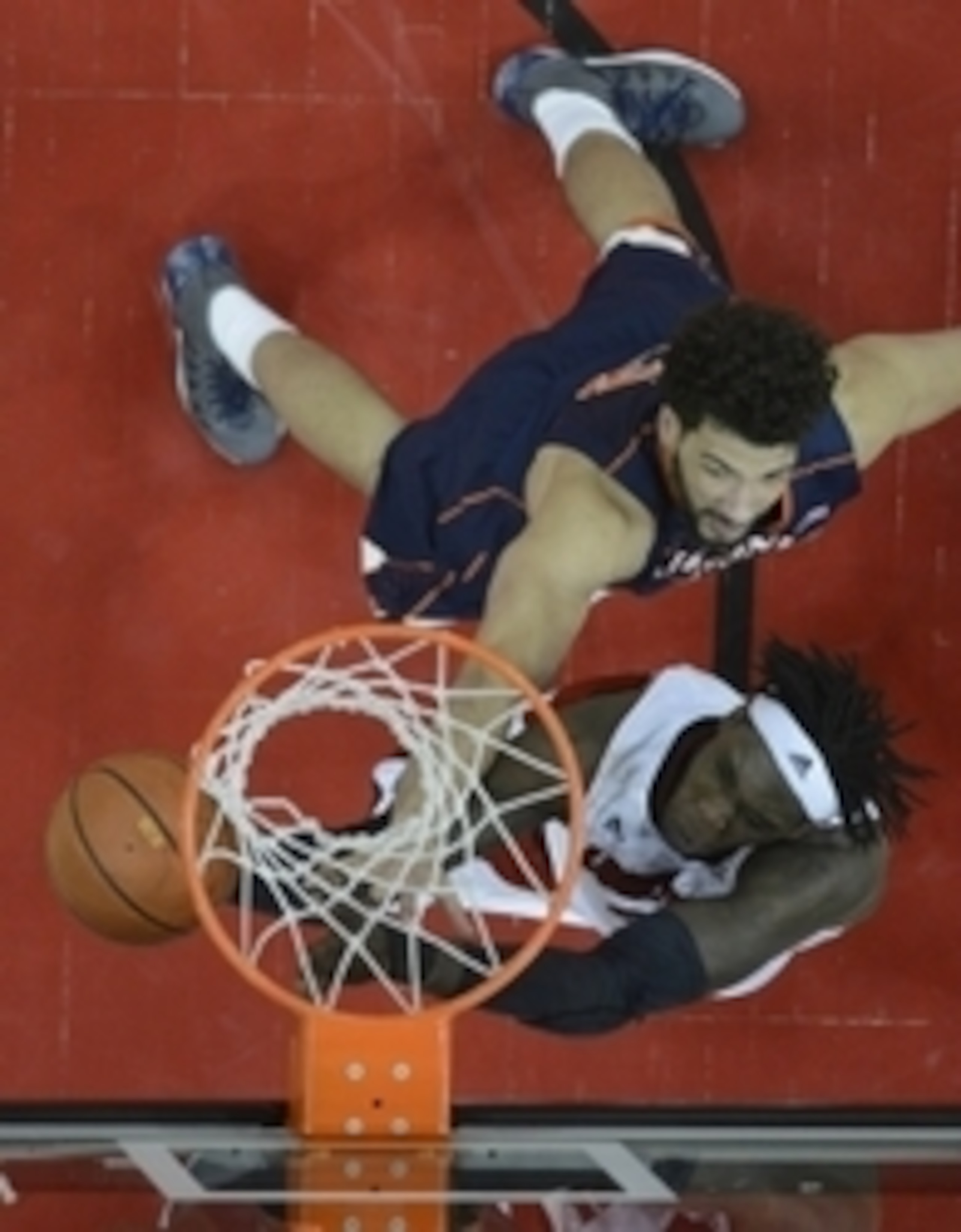 Virginia's Anthony Gill and Louisville's Montrezl Harrell battle under the basket