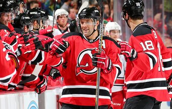 Andy Greene celebrates his goal in a game against the Carolina Hurricanes.