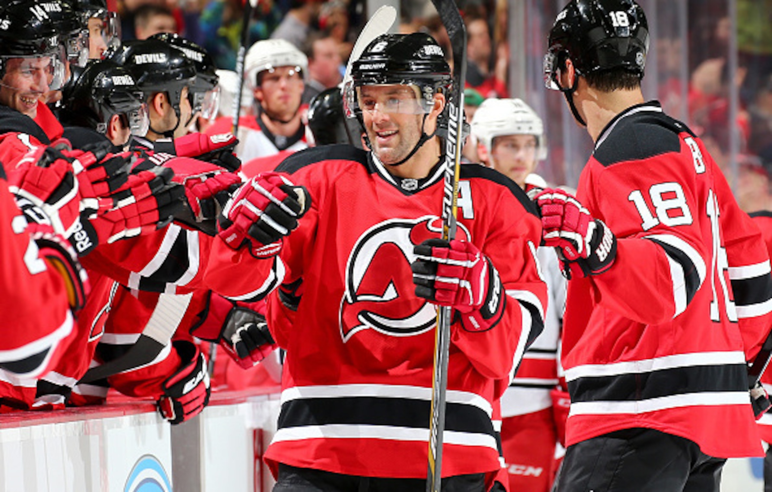 Andy Greene celebrates his goal in a game against the Carolina Hurricanes.