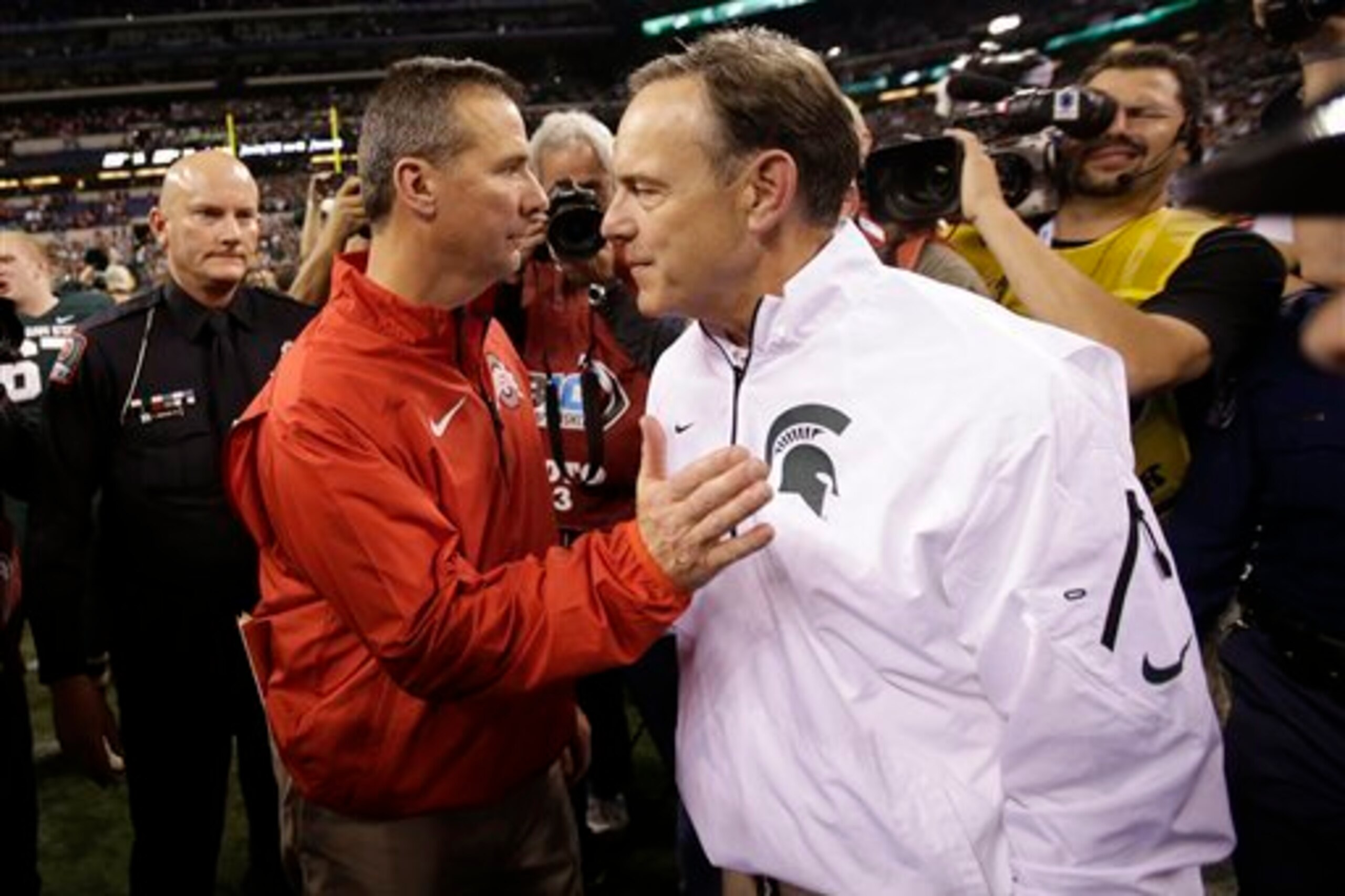 Urban Meyer, left, and Mark Dantonio build perennial conference contenders.
