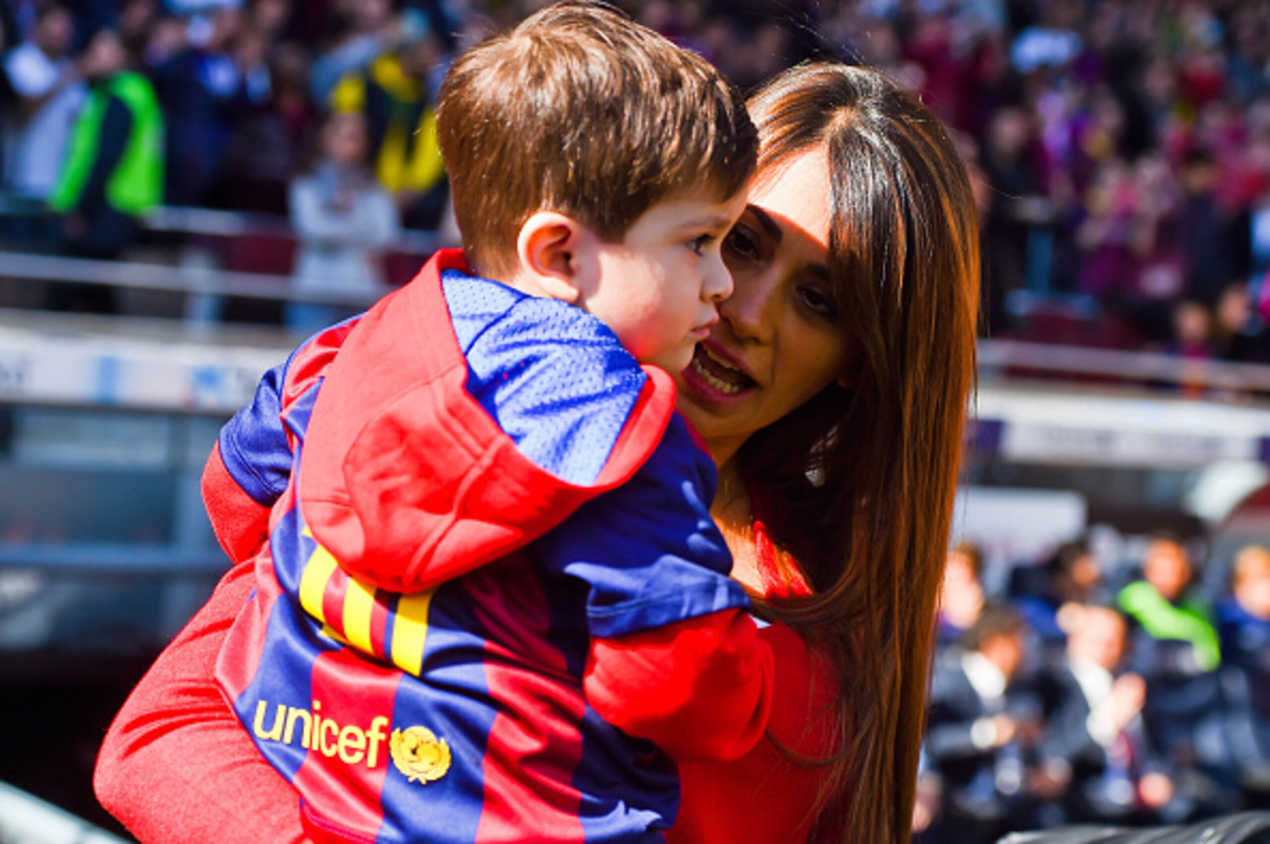 BARCELONA, SPAIN - MARCH 08:  Lionel Messi's wife Antonella Roccuzzo holds her son Thiago prior to the La Liga match between FC Barcelona and Rayo Vallecano de Madrid at Camp Nou on March 8, 2015 in Barcelona, Spain.  (Photo by David Ramos/Getty Images)