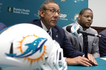 Dolphins owner Stephen Ross and Ndamukong Suh