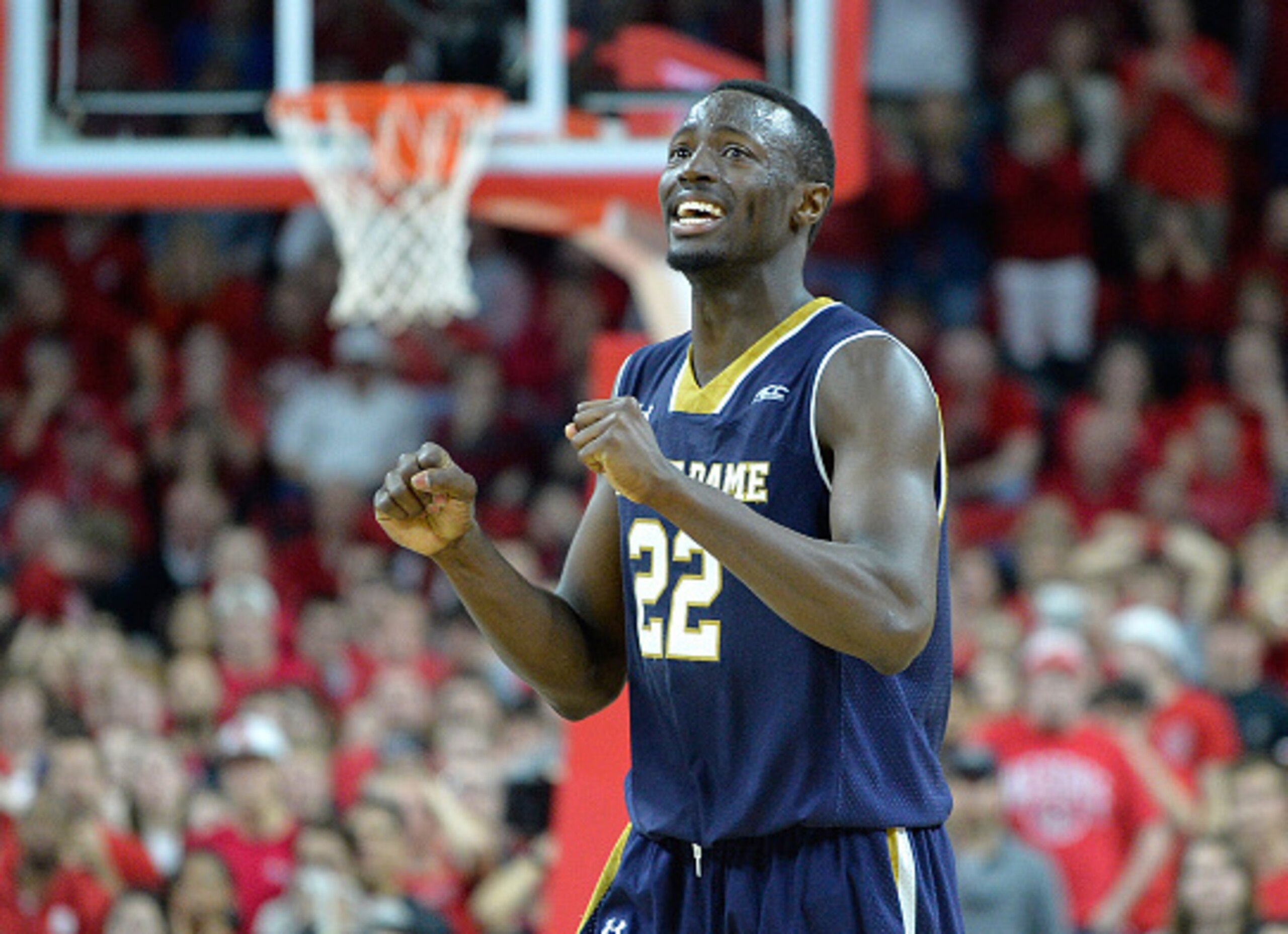 RALEIGH, NC - JANUARY 25:  Jerian Grant #22 of the Notre Dame Fighting Irish reacts during the final seconds of a win against the North Carolina State Wolfpack at PNC Arena on January 25, 2015 in Raleigh, North Carolina. Notre Dame won 81-78 in overtime. 