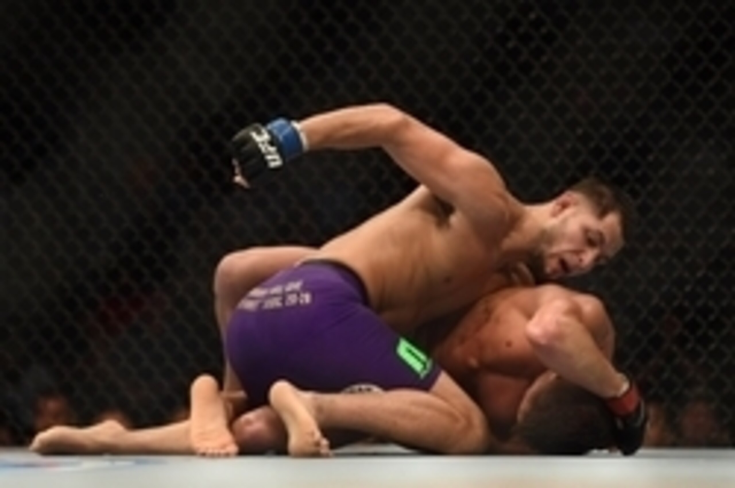 July 26, 2014; San Jose, CA, USA; Daron Cruickshank (red gloves) is hit by Jorge Masvidal (blue gloves) during the lightweight bout of the FOX UFC Saturday at SAP Center. Mandatory Credit: Kyle Terada-USA TODAY Sports July 26, 2014; San Jose, CA, USA; Daron Cruickshank (red gloves) is hit by Jorge Masvidal (blue gloves) during the lightweight bout of the FOX UFC Saturday at SAP Center. Mandatory Credit: Kyle Terada-USA TODAY Sports