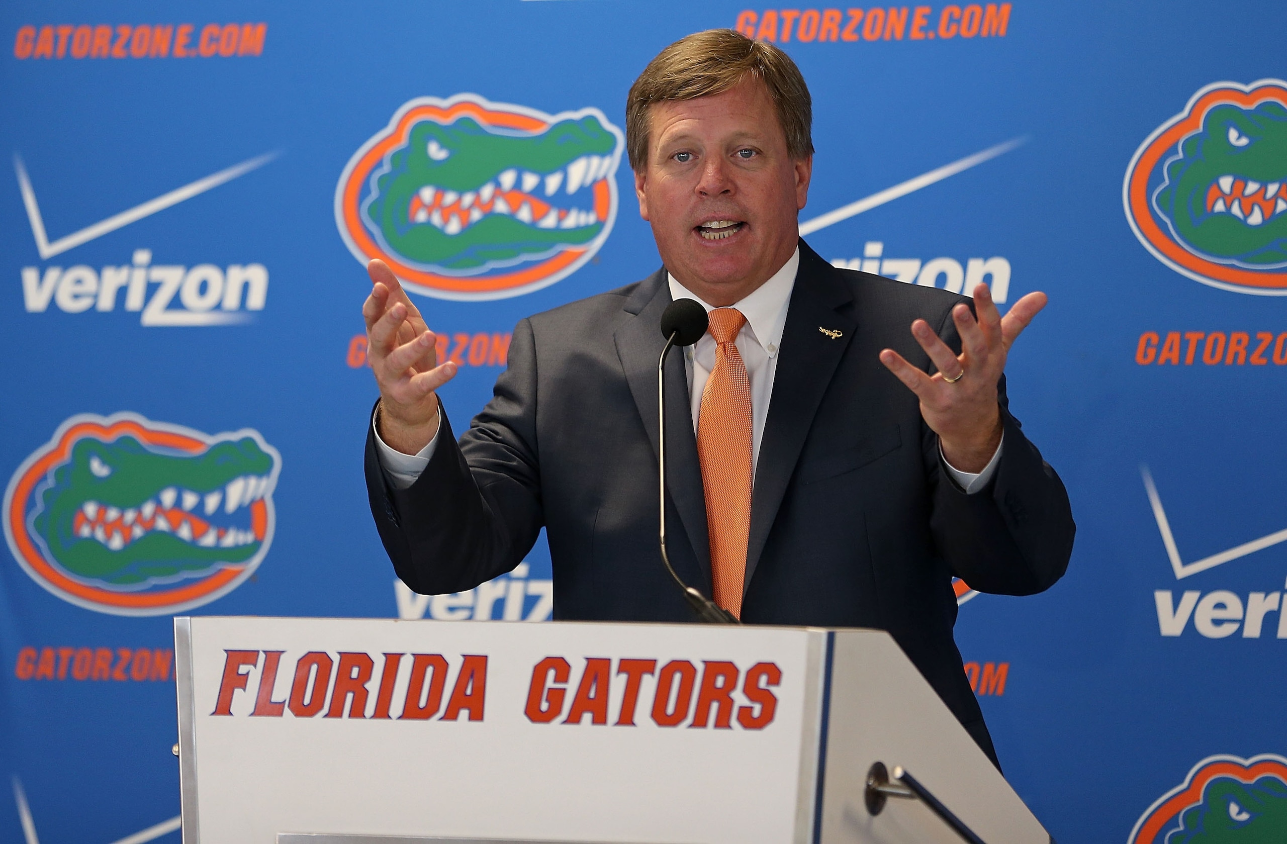 Jim McElwain hopes to match Billy Donovan's success as Florida's football coach.