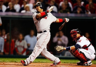 CLEVELAND - OCTOBER 18:  Manny Ramirez #24 of the Boston Red Sox hits a double in the first inning against the Cleveland Indians during Game Five of the American League Championship Series at Jacobs Field on October 18, 2007 in Cleveland, Ohio.  (Photo by