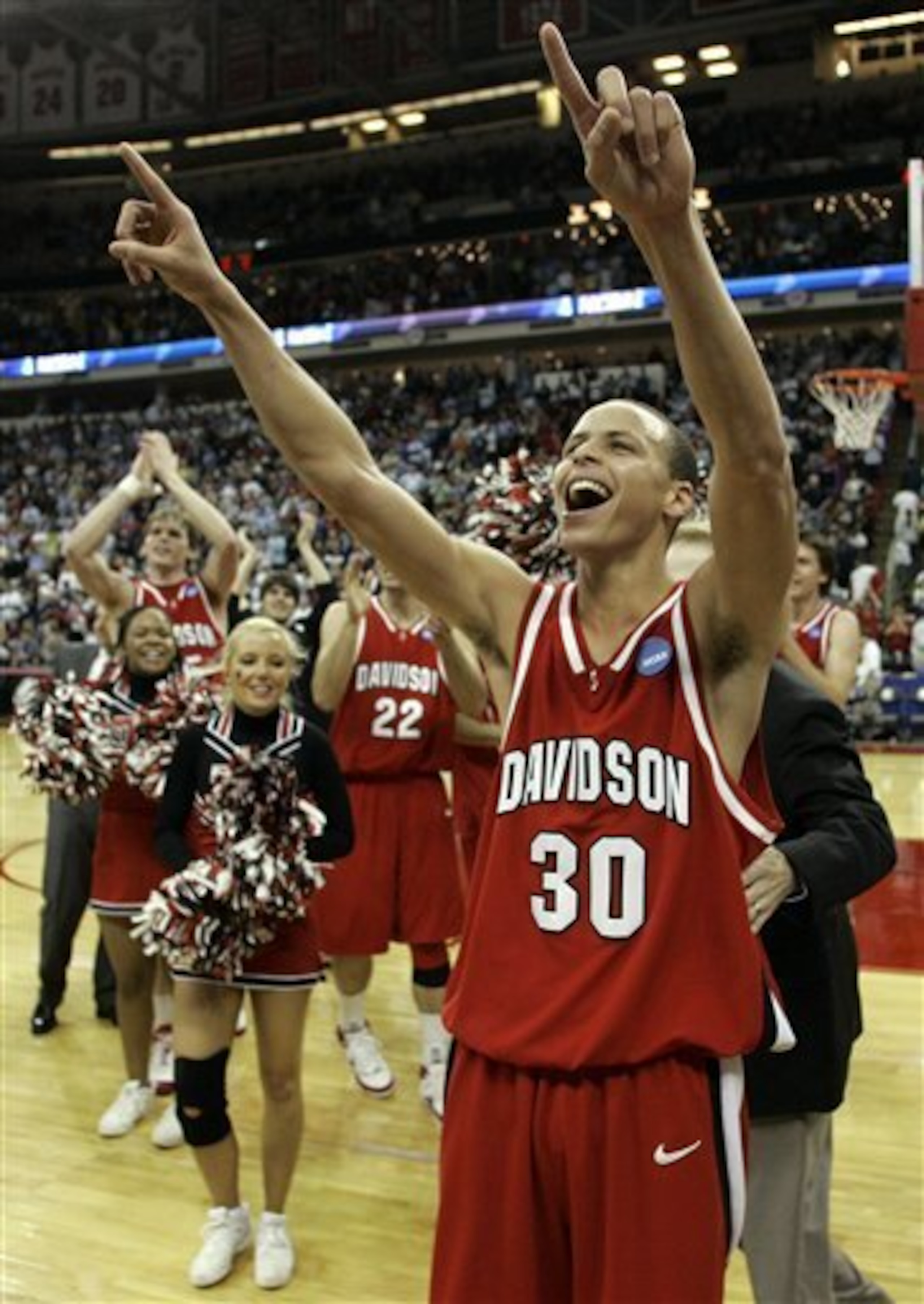 Steph Curry celebrates Davidson's round of 64 triumph over Gonzaga.