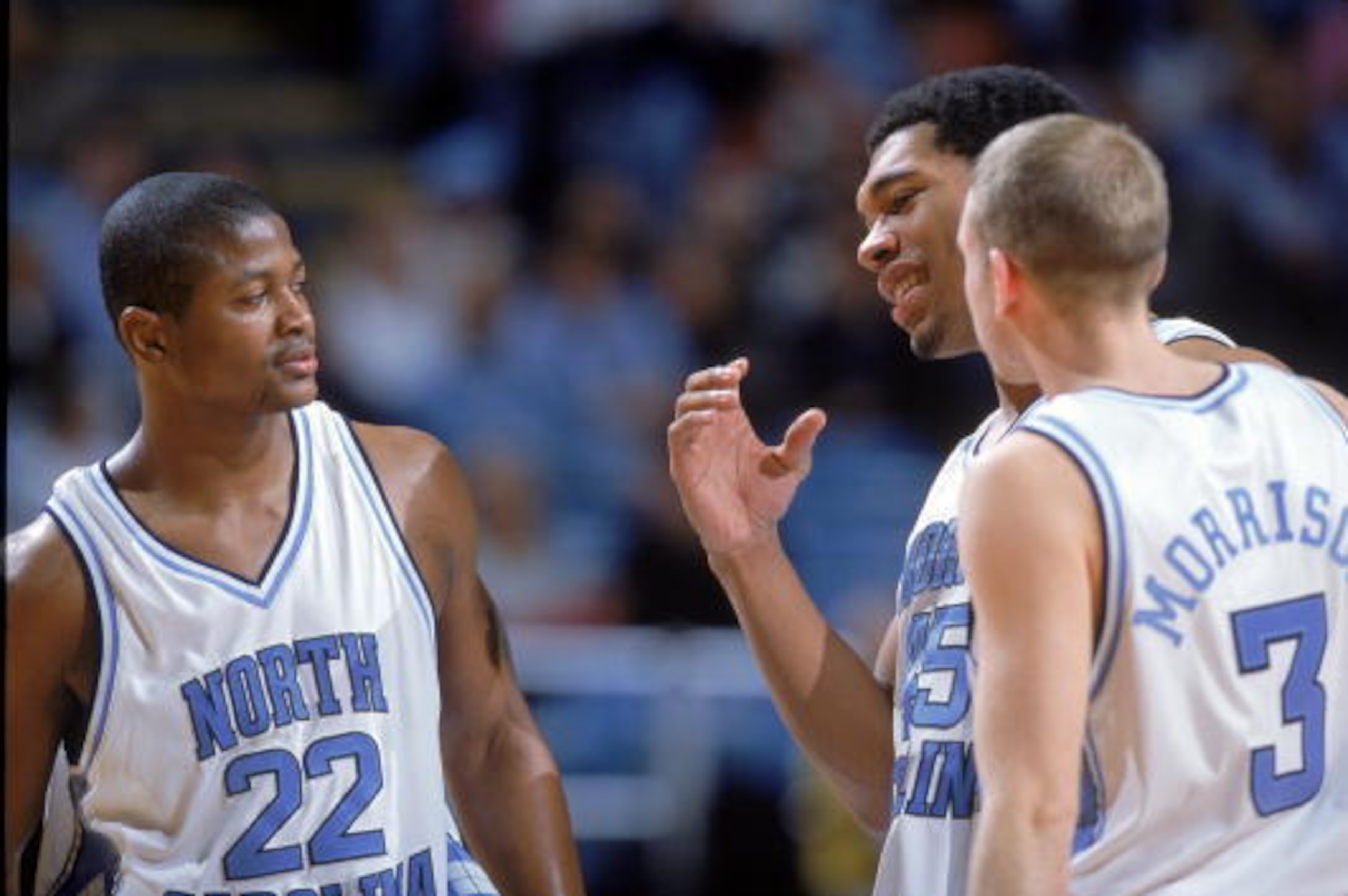Ronald Curry (left) and Julius Peppers (center) were standout football players at North Carolina who were also on the Tar Heels' basketball team.