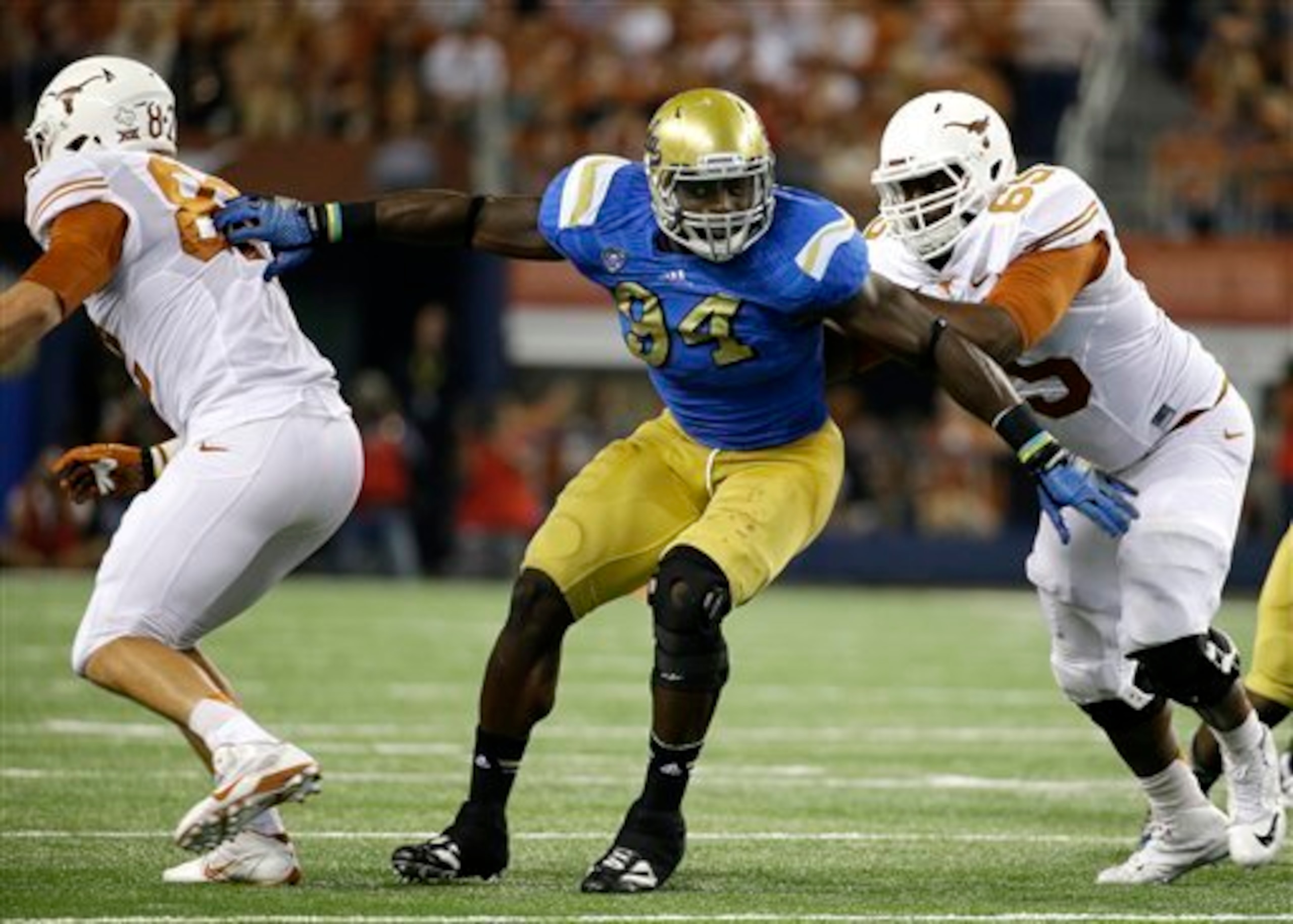 Hutchins (far right) struggled in his first season moving from the defensive line to left tackle.