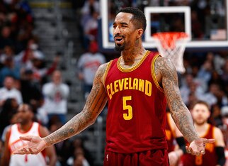 ATLANTA, GA - MARCH 06:  J.R. Smith #5 of the Cleveland Cavaliers reacts during the game against the Atlanta Hawks at Philips Arena on March 6, 2015 in Atlanta, Georgia.  NOTE TO USER: User expressly acknowledges and agrees that, by downloading and/or usi