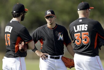 The Marlins brought in Dan Haren (left) and Mat Latos (right) this offseason to bolster a staff that already includes a budding star in Jose Fernandez (center).