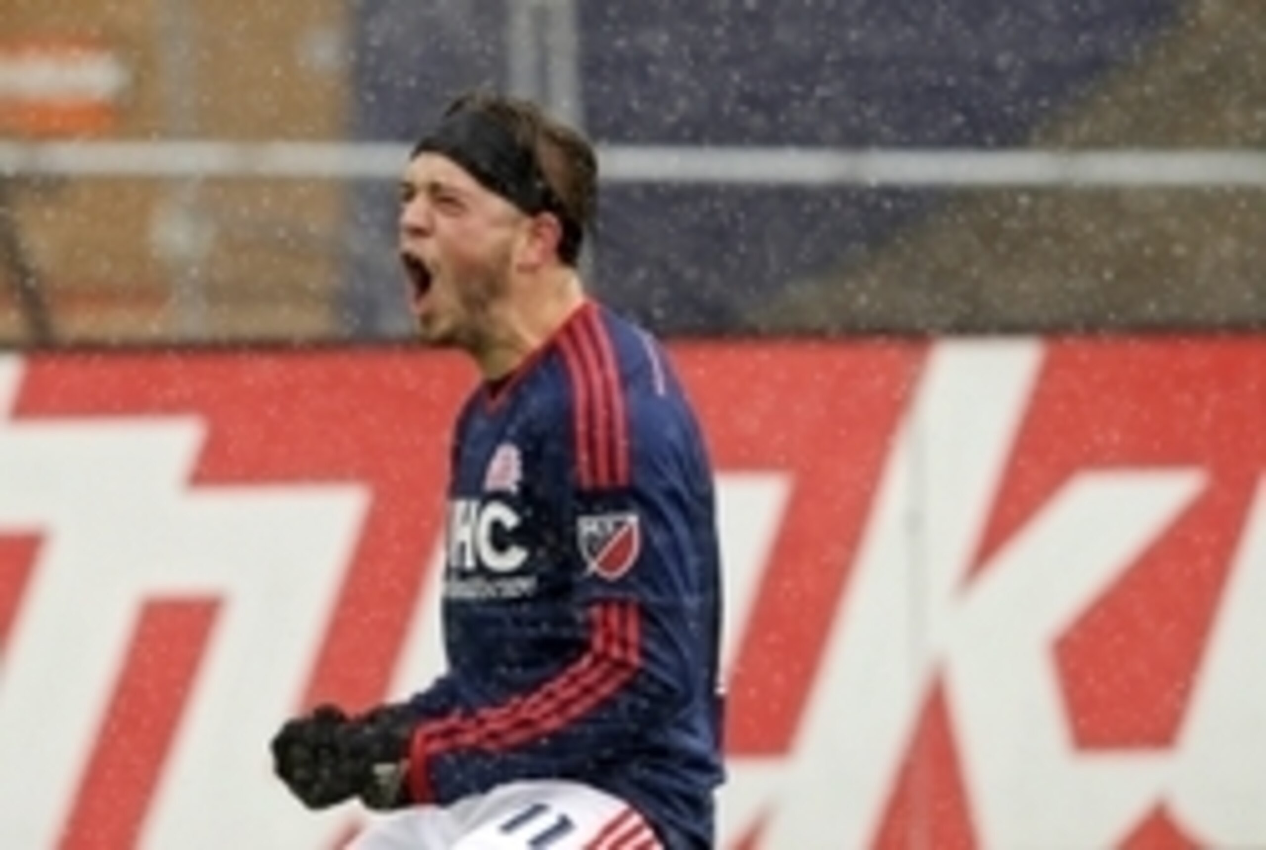 Mar 28, 2015; Foxborough, MA, USA; New England Revolution midfielder Kelyn Rowe (11) reacts after scoring  his second goal of the day against the San Jose Earthquakes  in the first half at Gillette Stadium. Mandatory Credit: David Butler II-USA TODAY Spor