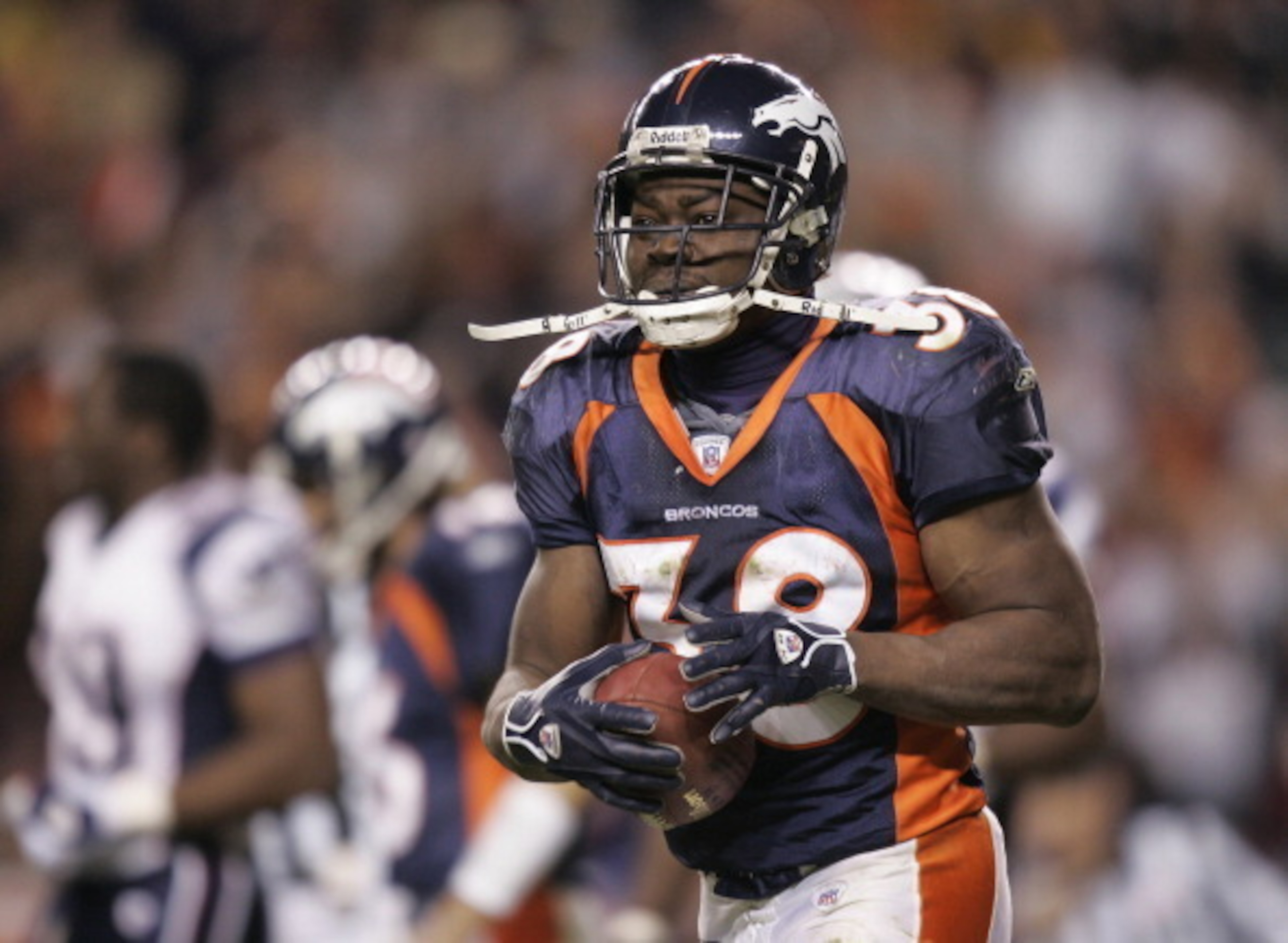 Running back Mike Anderson of the Denver Broncos after scoring a touchdown during the AFC Divisional Playoff game against the New England Patriots at Invesco Field at Mile High in Denver, Colorado on January 14, 2005. (Photo by Mike Ehrmann/NFLPhotoLibrar