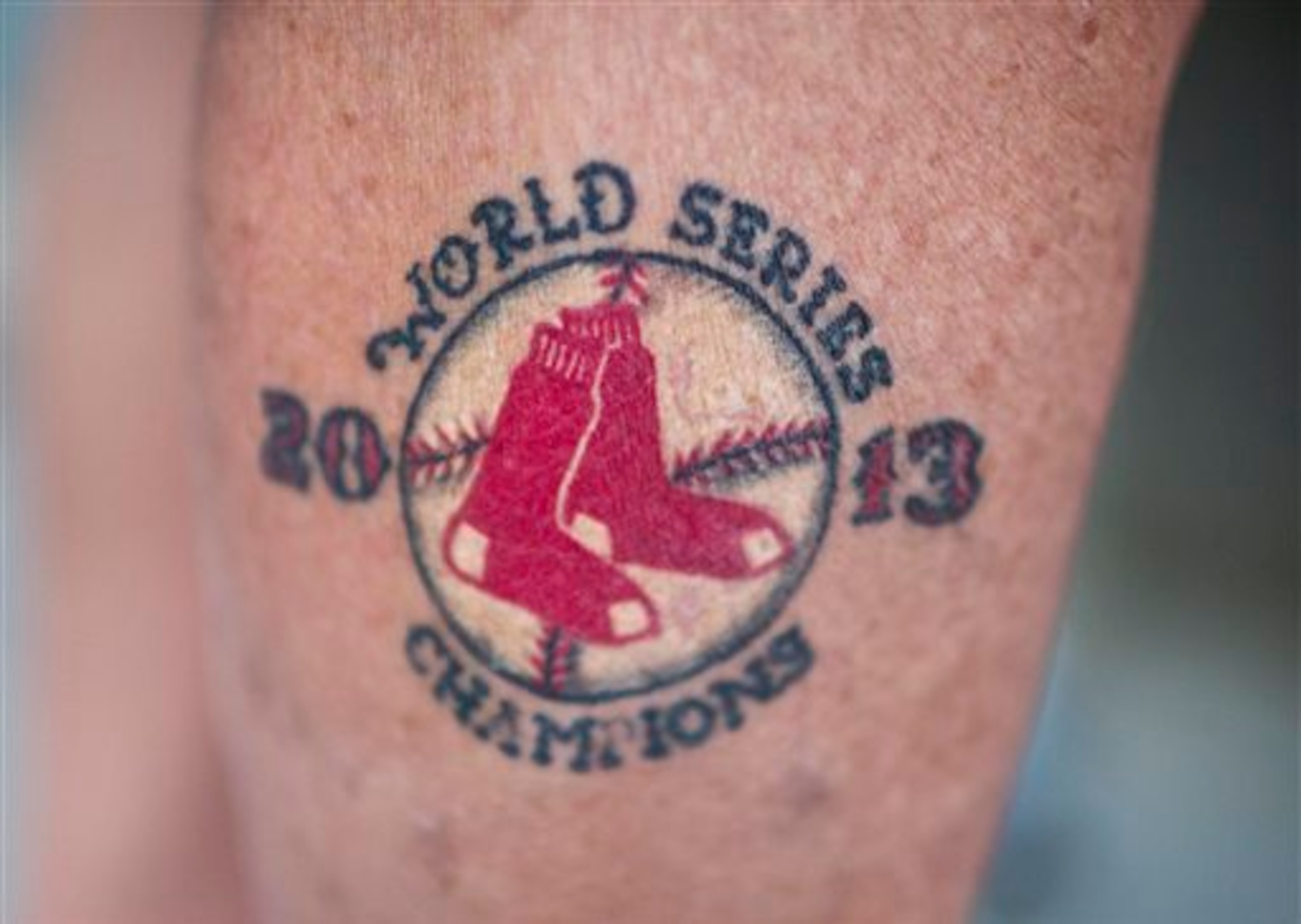 Some fans love their teams enough to celebrate them via permanent branding.