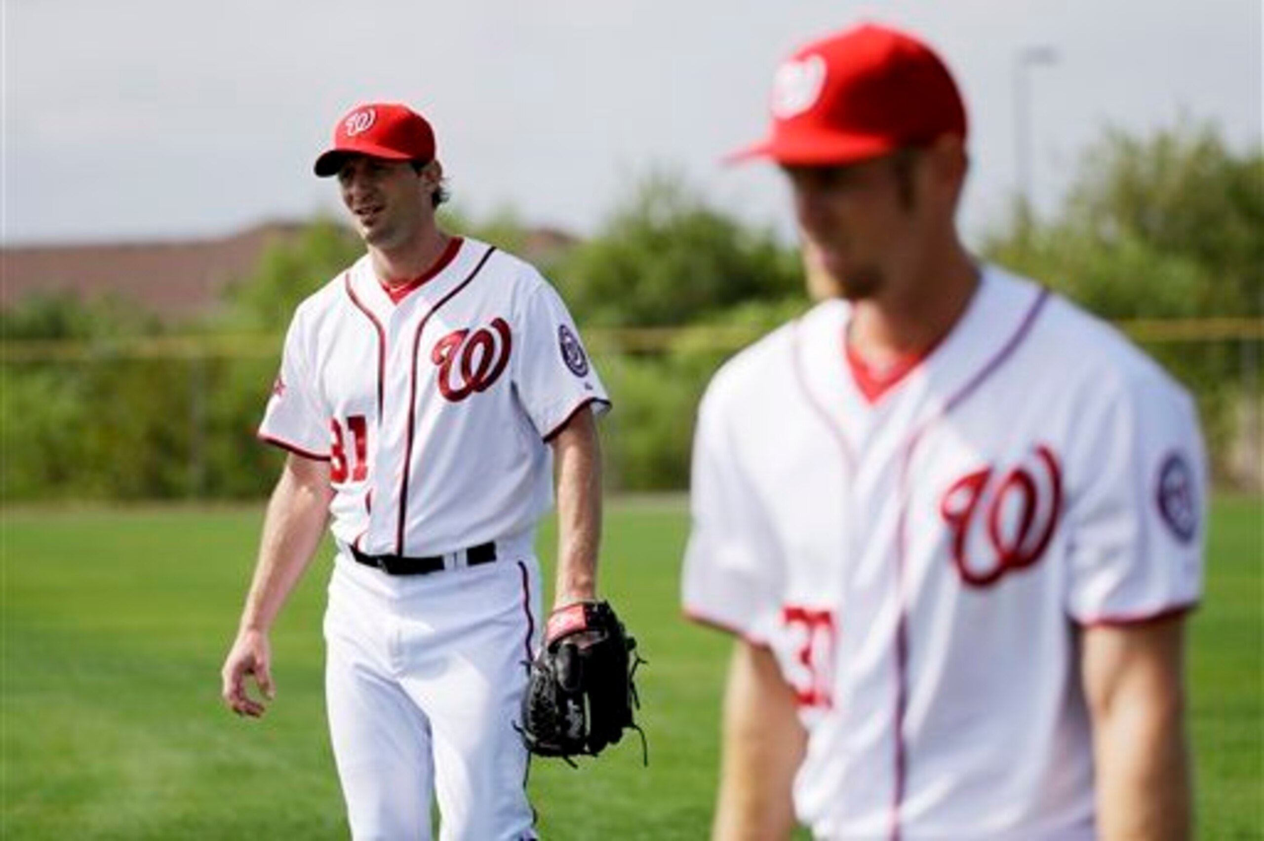 Max Scherzer (left) supplanted Stephen Strasburg (right) as Washington's Opening Day starter.