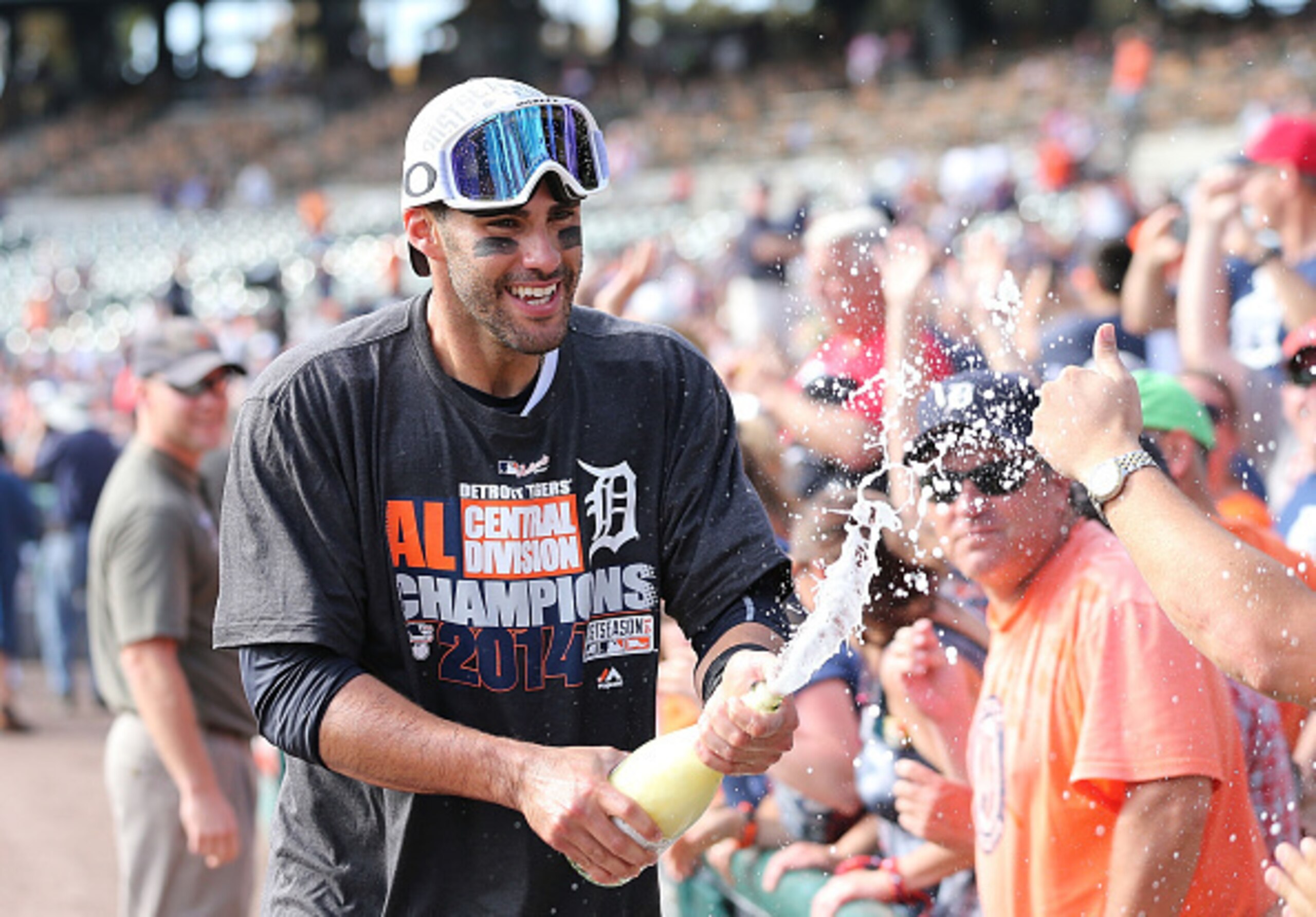 DETROIT, MI - SEPTEMBER 28:  J.D.Martinez #28 of the Detroit Tigers celebrates with the fans a win over the Minnesota Twins and a Central Division Championship at Comerica Park on September 28, 2014 in Detroit, Michigan. The Tigers defeated the Twins 3-0.