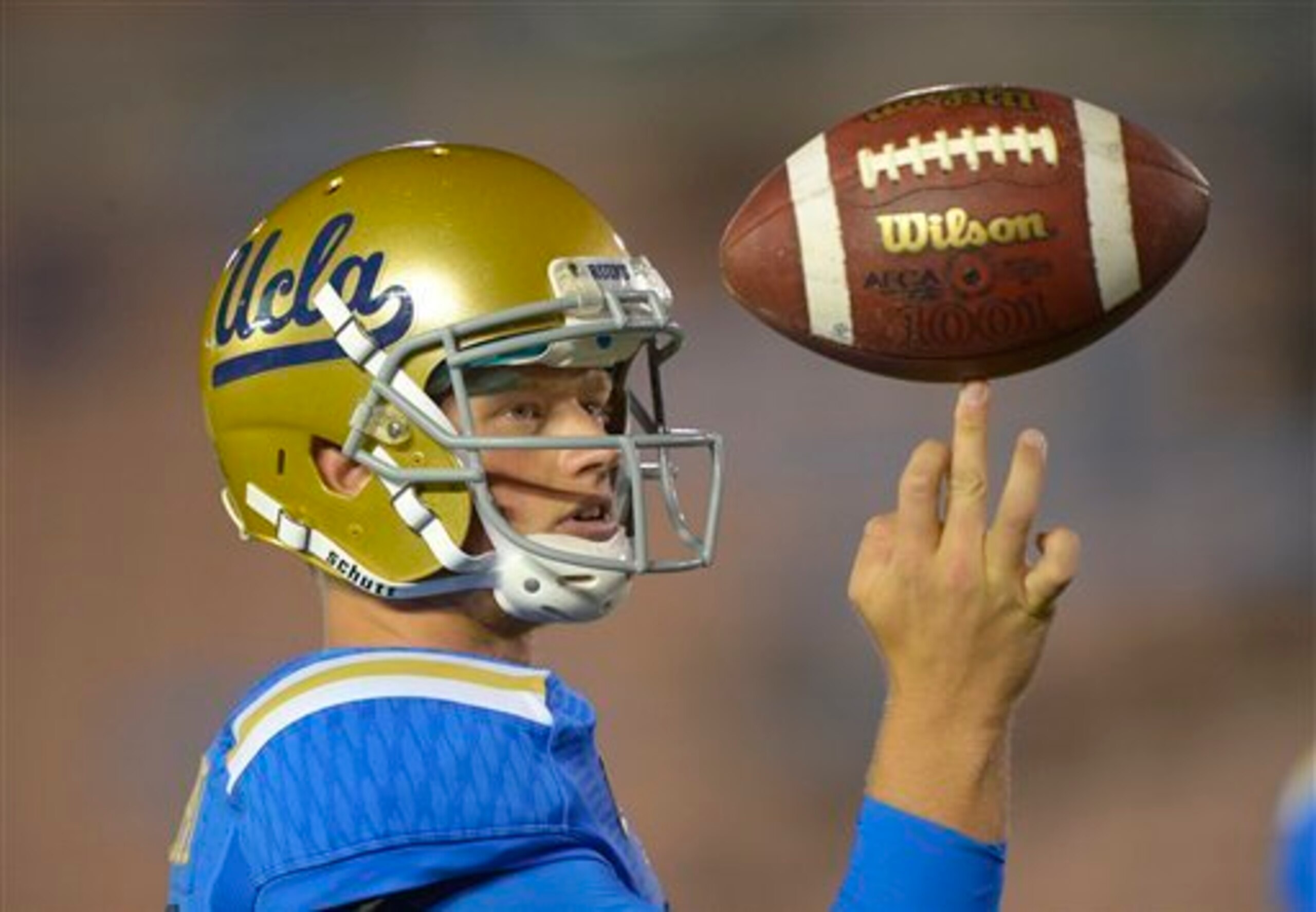 Neuheisel is battling for the starting job.