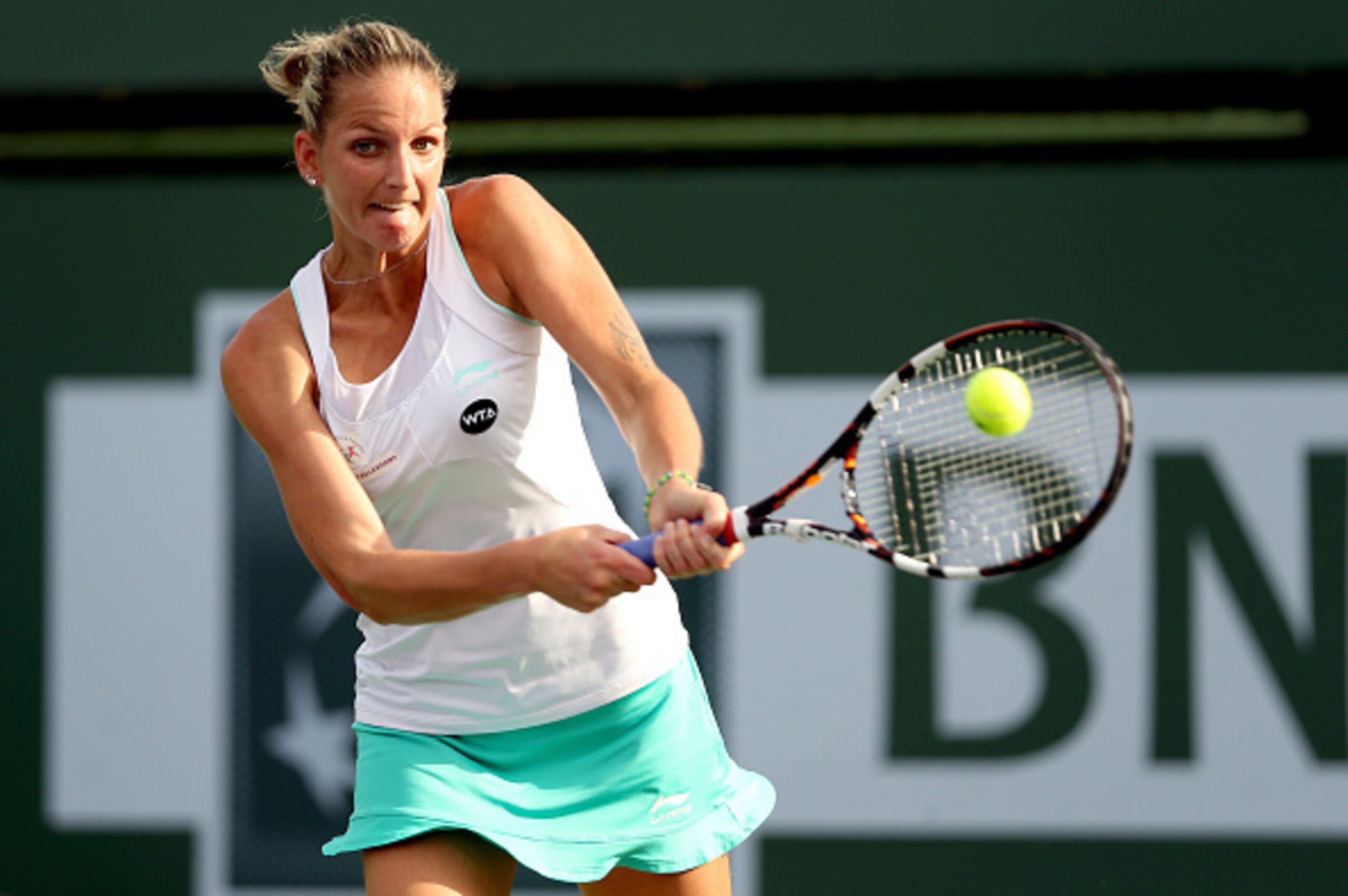 Karolina Pliskova hits a backhand at Indian Wells.