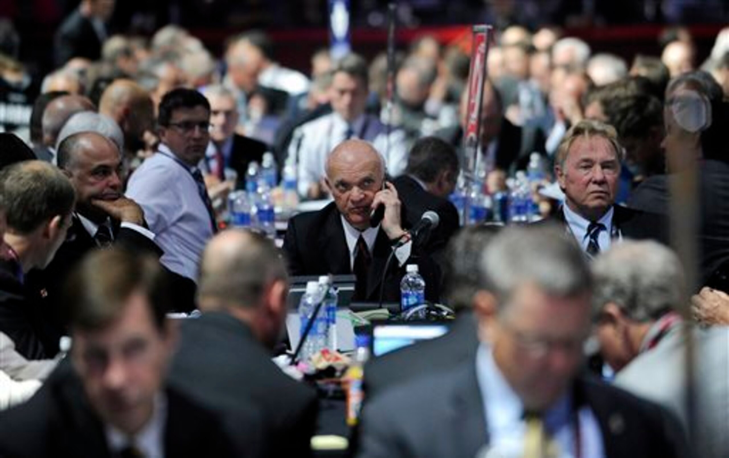 Lou Lamoriello makes a call at the 2013 NHL Entry Draft. Lou Lamoriello makes a call at the 2013 NHL Entry Draft.