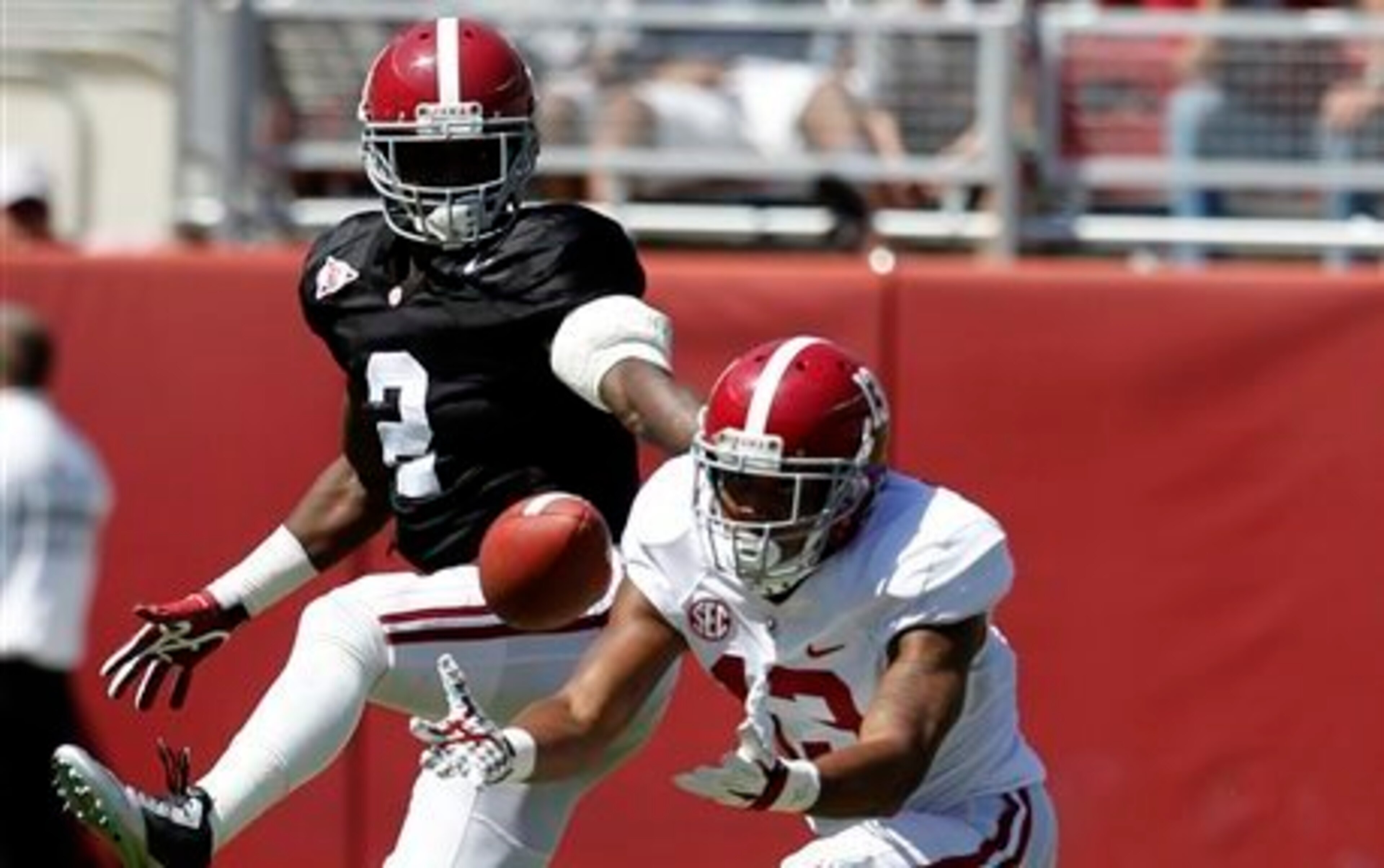 Alabama DB Tony Brown (left)
