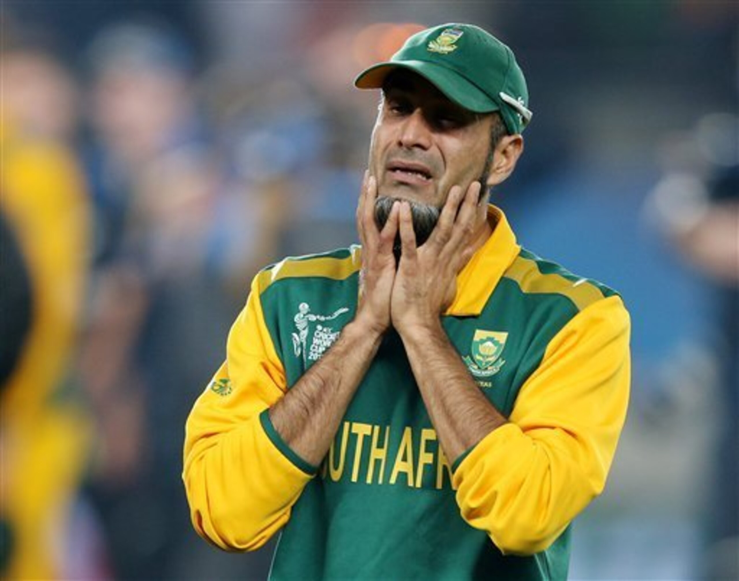 South Africa's Imran Tahir reacts after his team's four wicket loss to New Zealand in their Cricket World Cup semifinal in Auckland, New Zealand, Tuesday, March 24, 2015. (AP Photo/David Rowland)