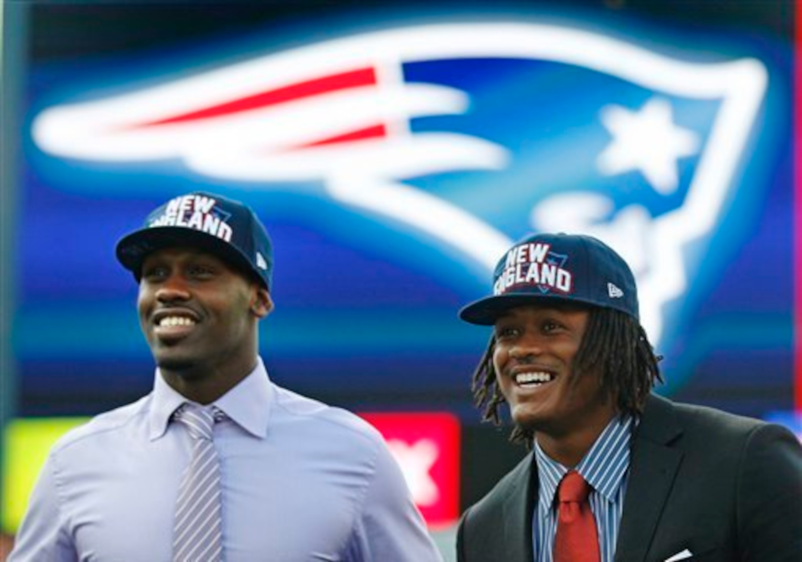 The Patriots traded up twice to acquire defensive end Chandler Jones (left) and linebacker Dont'a Hightower (right) in 2012. The Patriots traded up twice to acquire defensive end Chandler Jones (left) and linebacker Dont'a Hightower (right) in 2012.