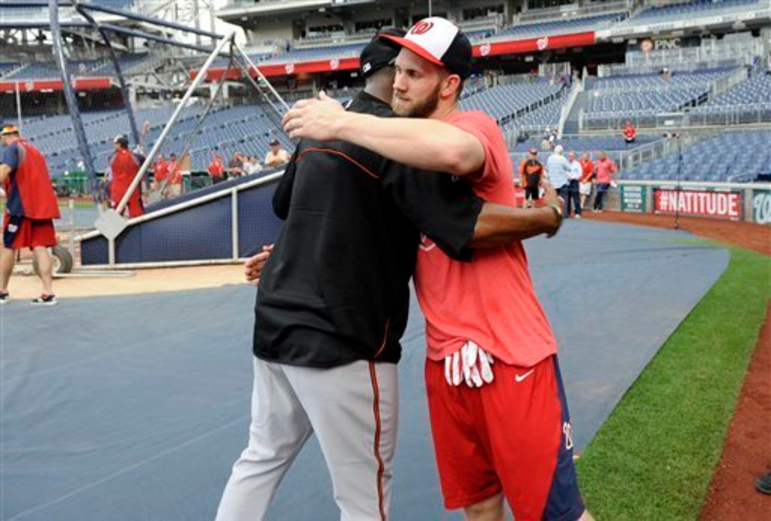 Adam Jones (left) and Bryce Harper