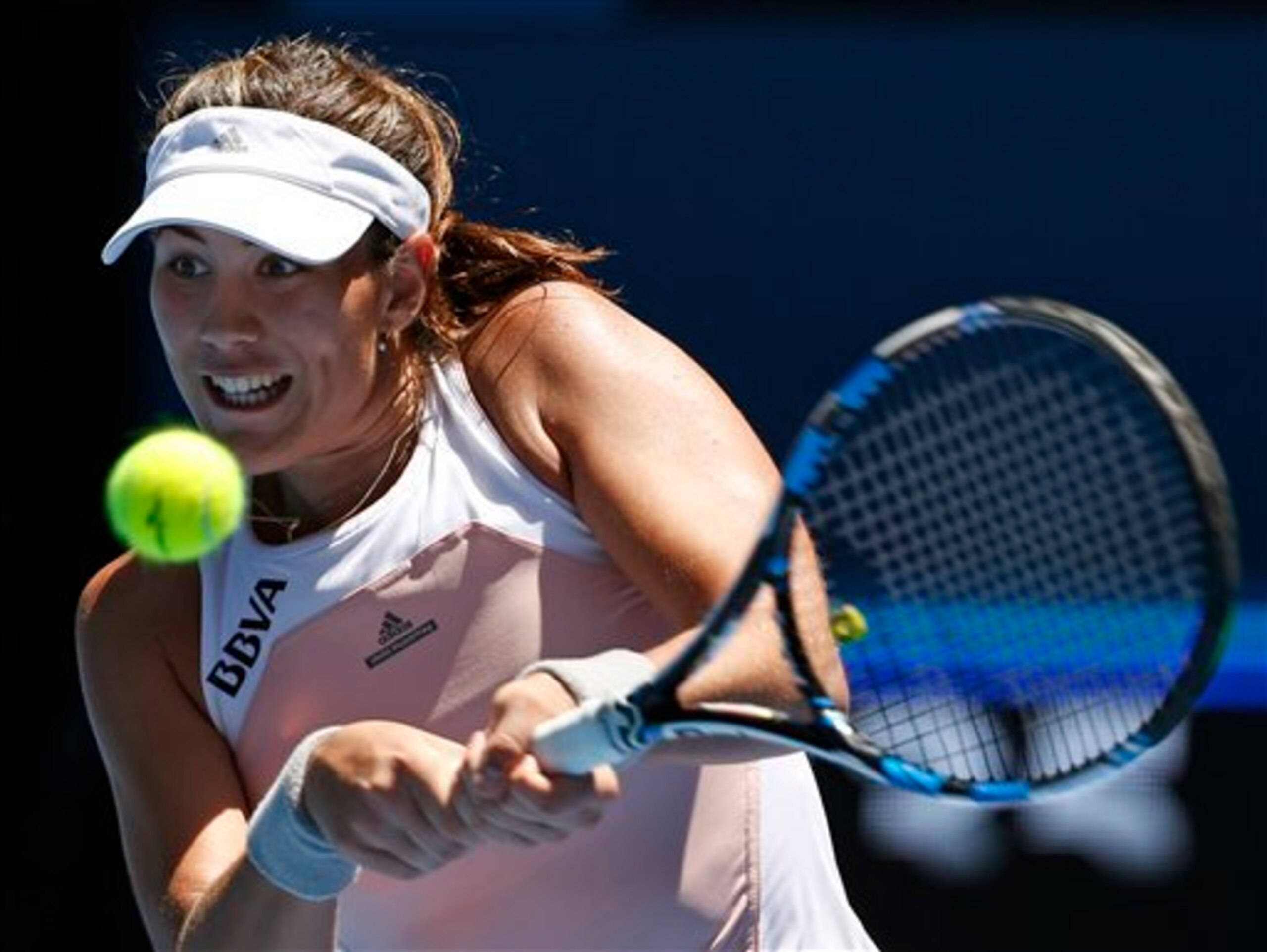 Garbine Muguruza hits a backhand during a match at the 2015 Australian Open.