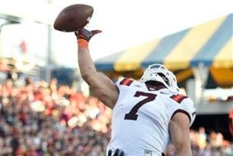 Virginia Tech tight end Bucky Hodges going high for a catch last season