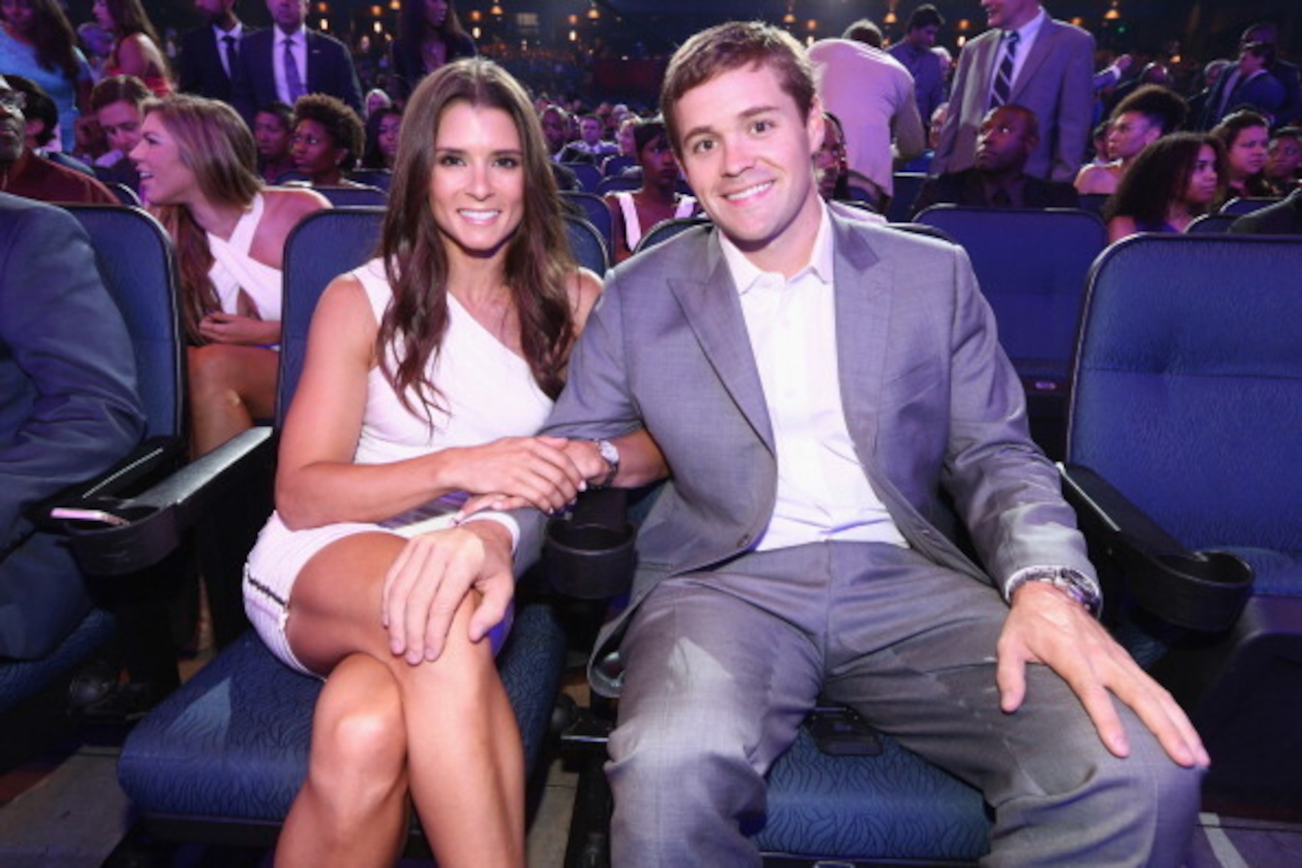Danica Patrick (left) is making news for more than what she does with boyfriend/fellow driver Ricky Stenhouse Jr. (right) off the track.