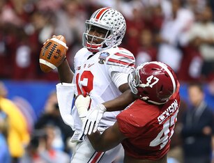 Dickson taking Cardale Jones down to the ground.