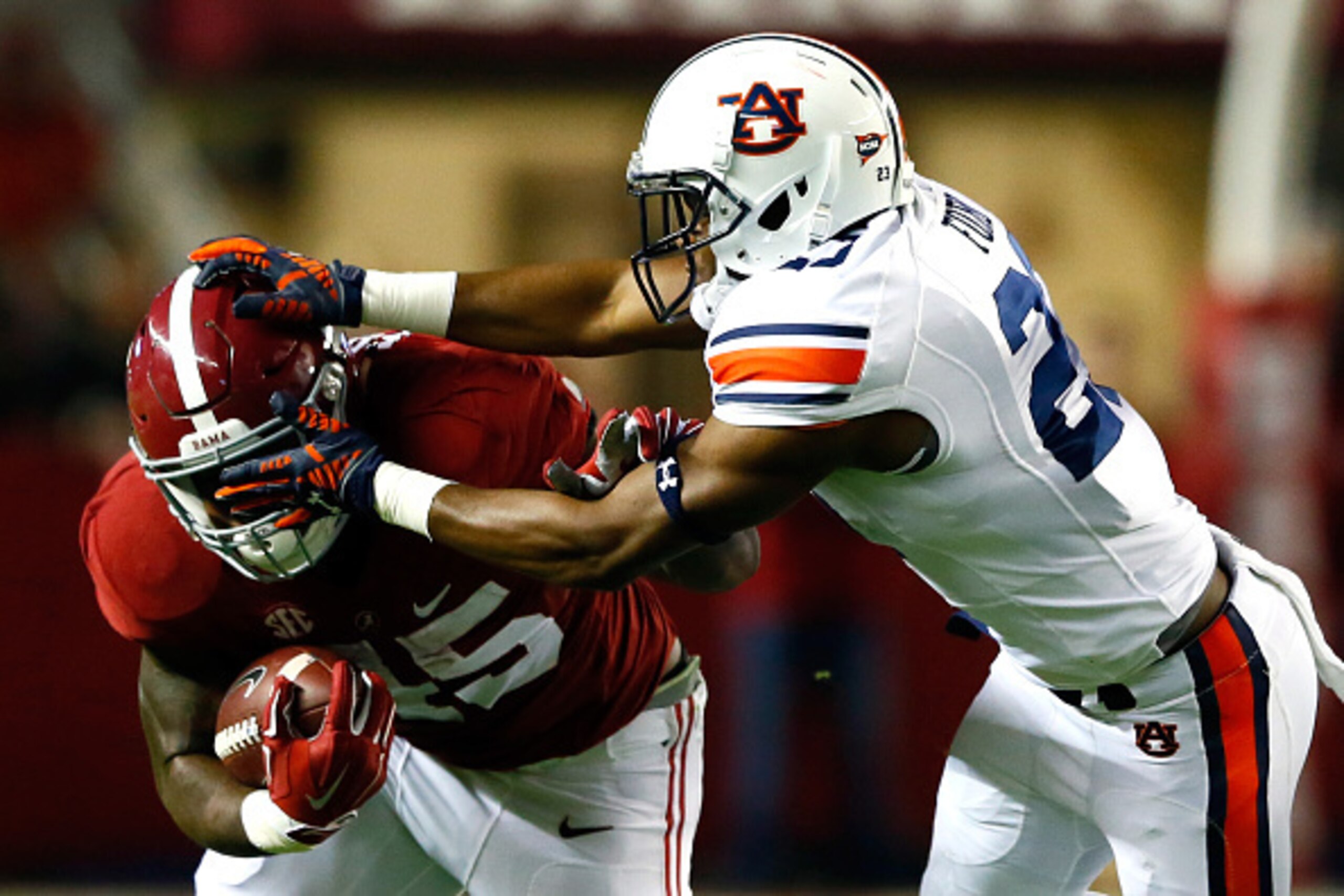 Fowler breaking a tackle versus an Auburn defender.