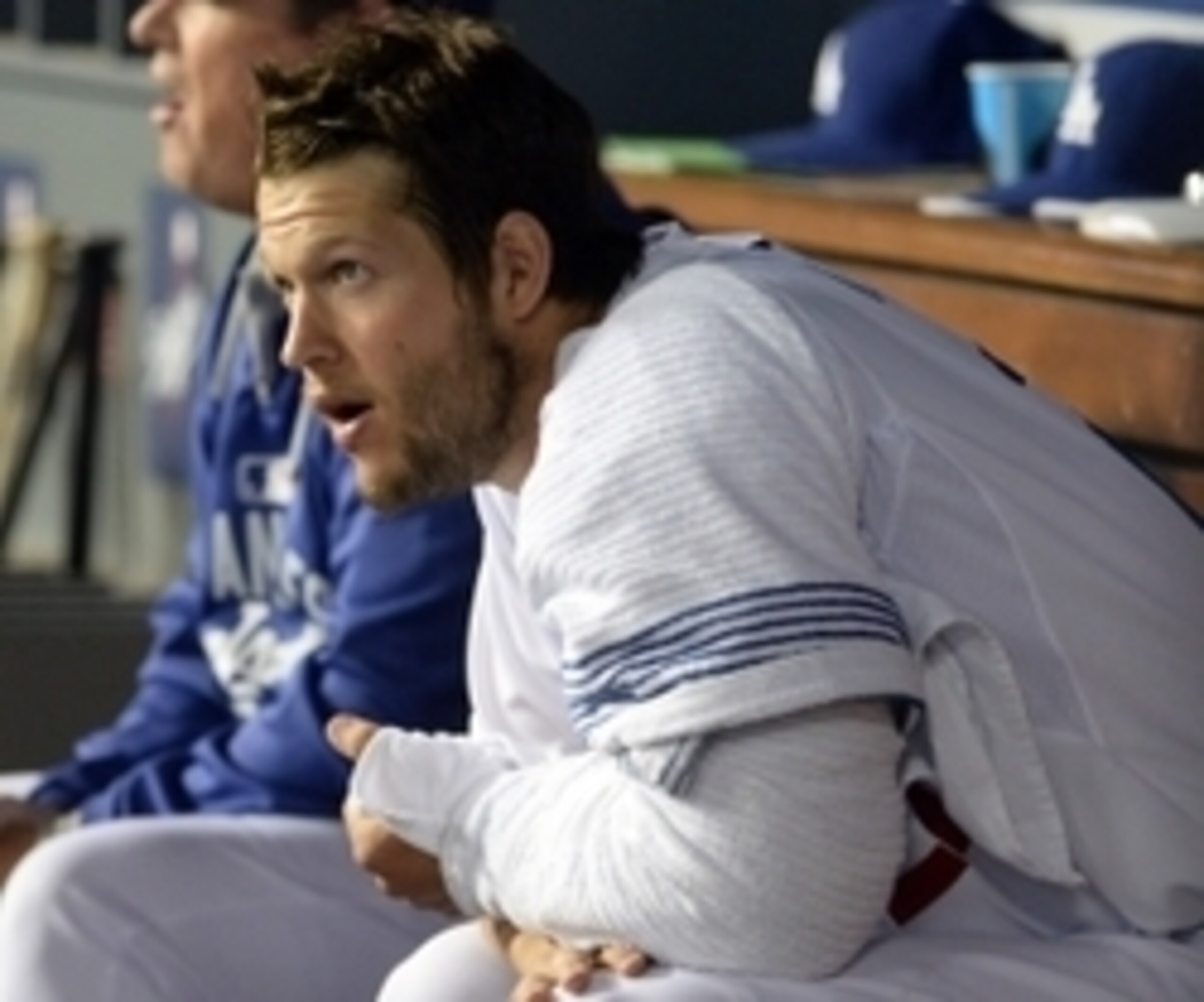 Apr 17, 2015; Los Angeles, CA, USA; Los Angeles Dodgers starting pitcher Clayton Kershaw (22) in the dugout during the game against the Colorado Rockies at Dodger Stadium. Mandatory Credit: Jayne Kamin-Oncea-USA TODAY Sports