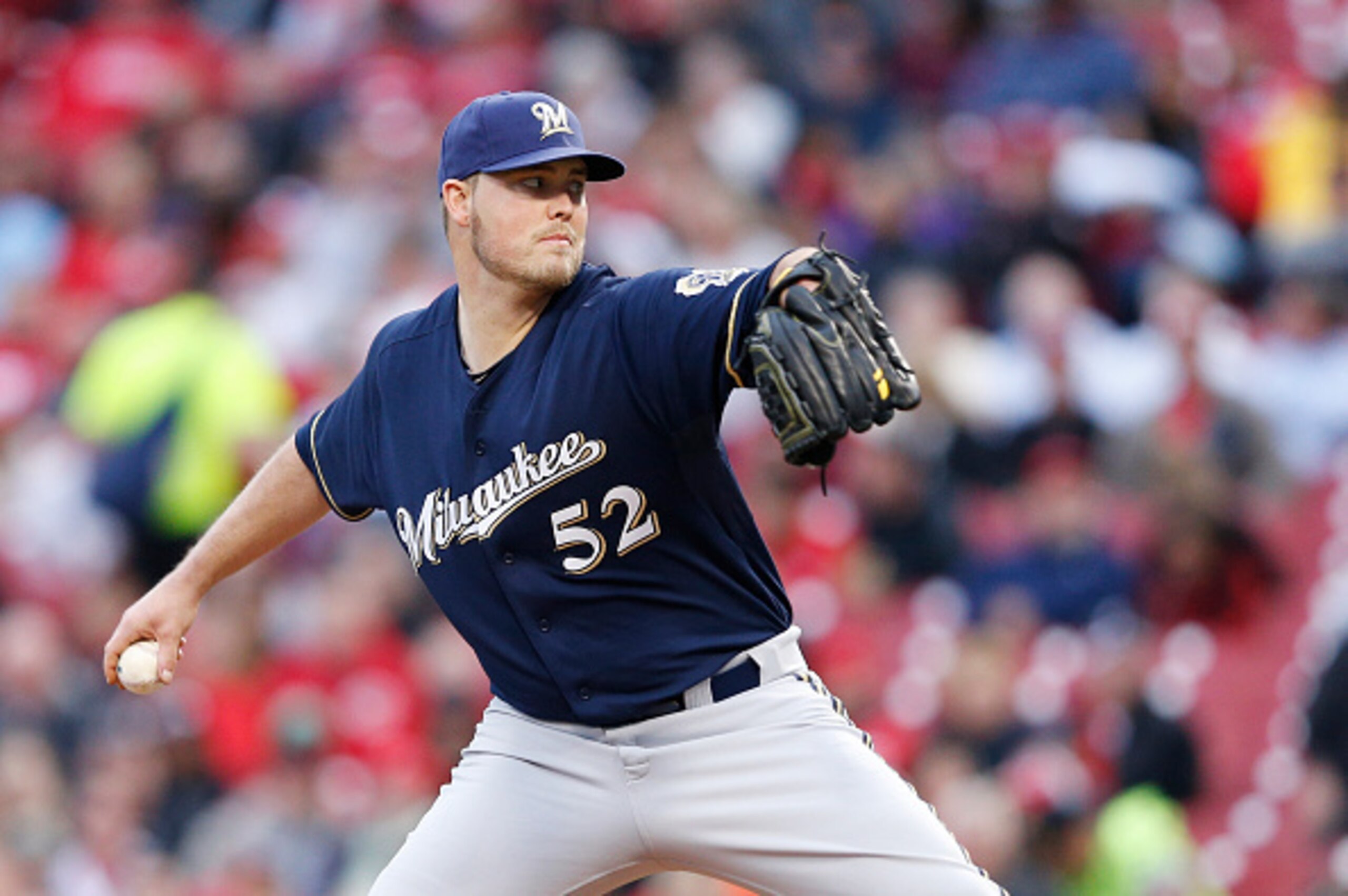 CINCINNATI, OH - APRIL 27: Jimmy Nelson #52 of the Milwaukee Brewers pitches in the second inning of the game against the Cincinnati Reds at Great American Ball Park on April 27, 2015 in Cincinnati, Ohio. (Photo by Joe Robbins/Getty Images)