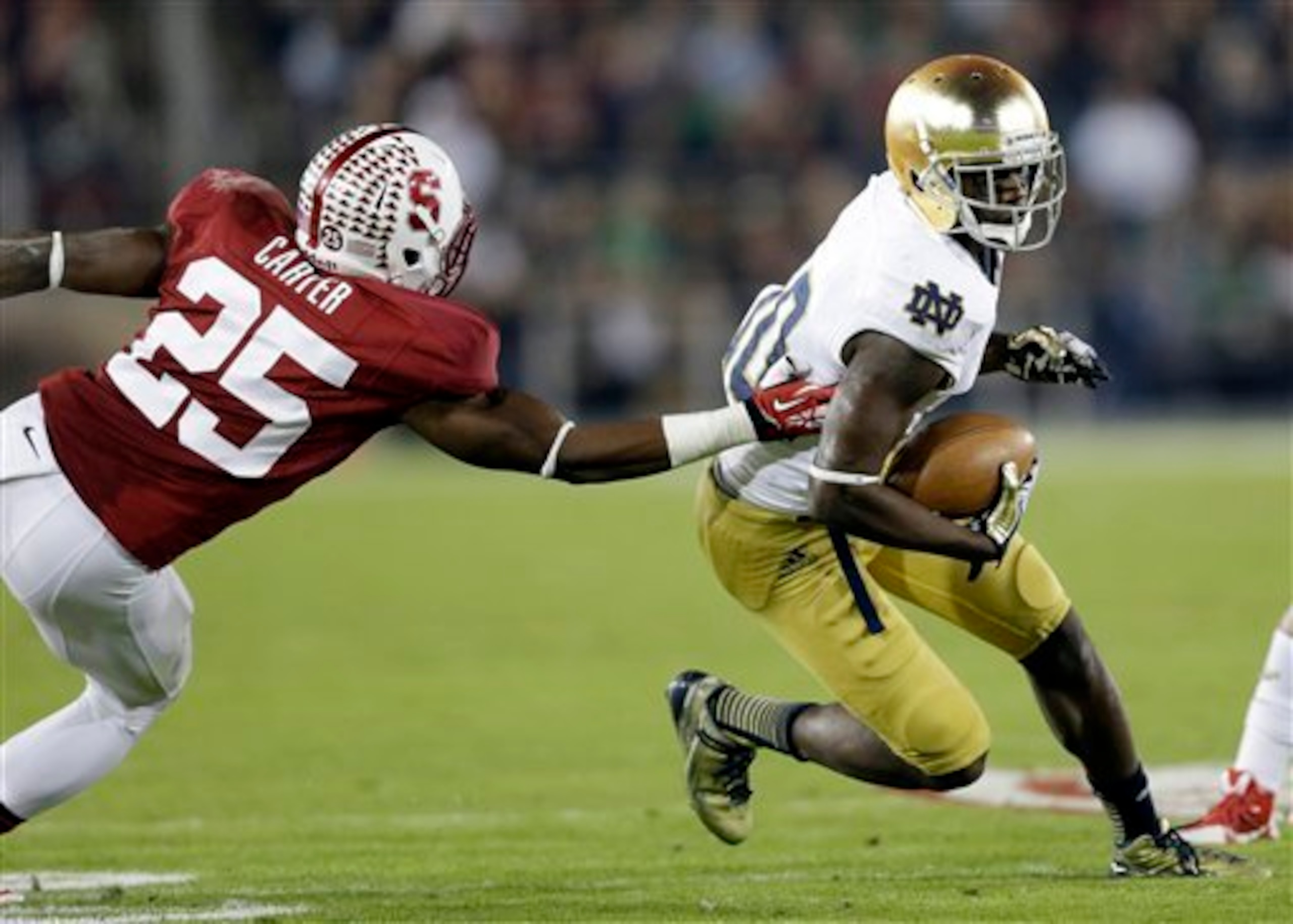 Daniels evading a Stanford defender.