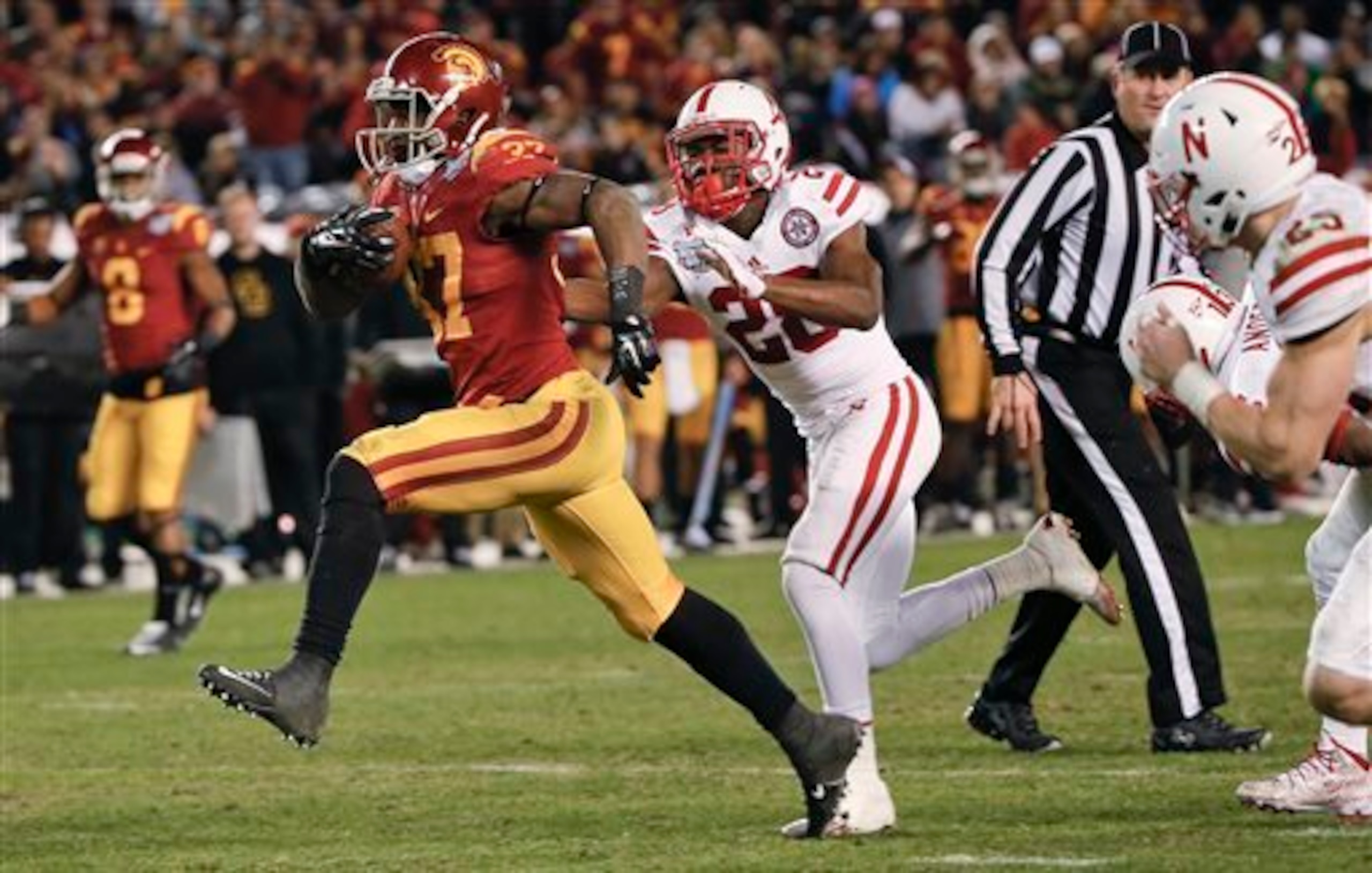 Allen running away from a Nebraska defender.