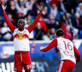 Bradley Wright-Phillips and Sacha Kljestan celebrate a goal against D.C. United.
