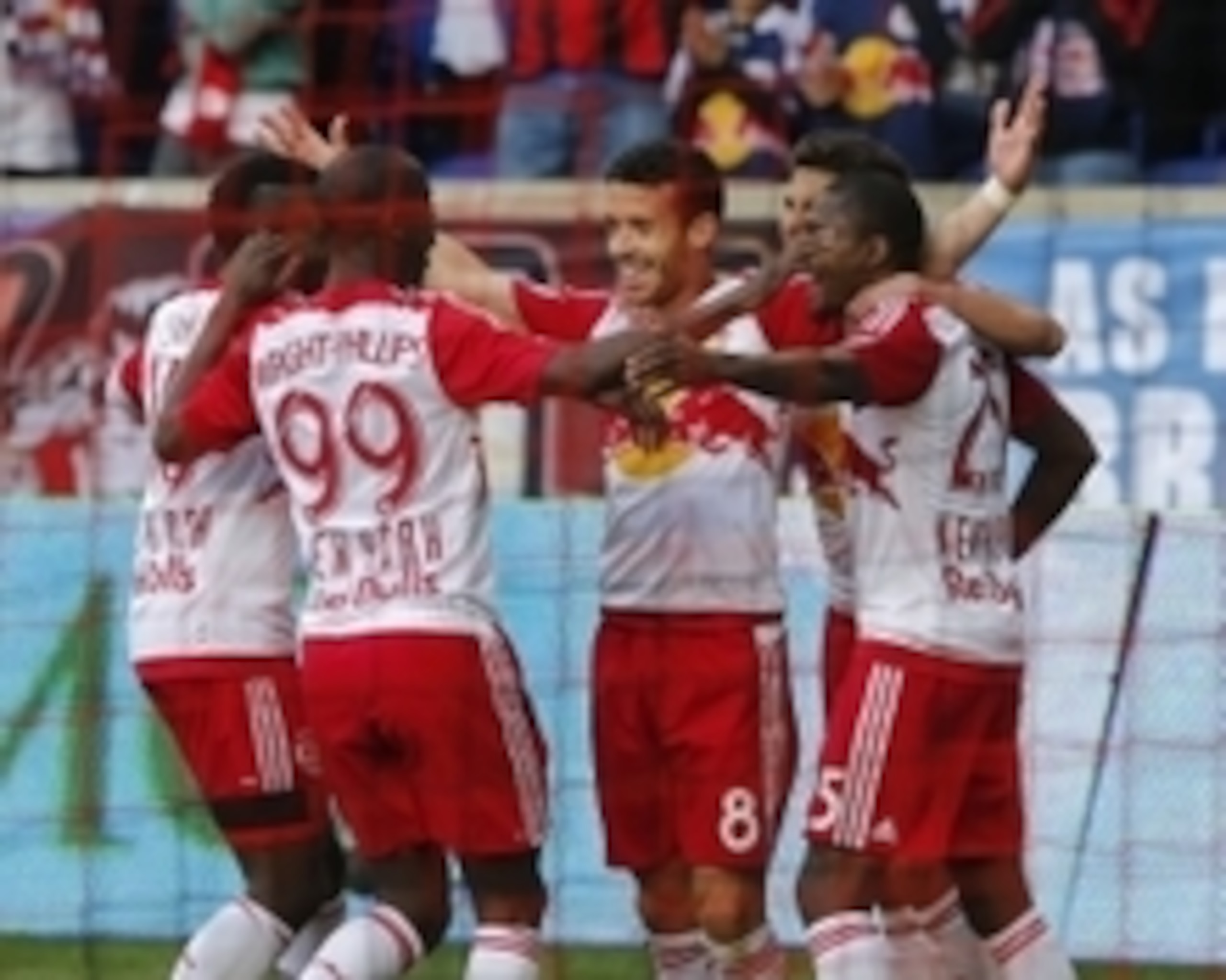 The Red Bulls celebrate Felipe's equalizer.