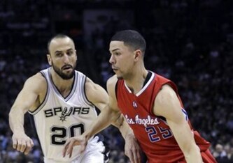 Rivers guarded by San Antonio's Manu Ginobili.