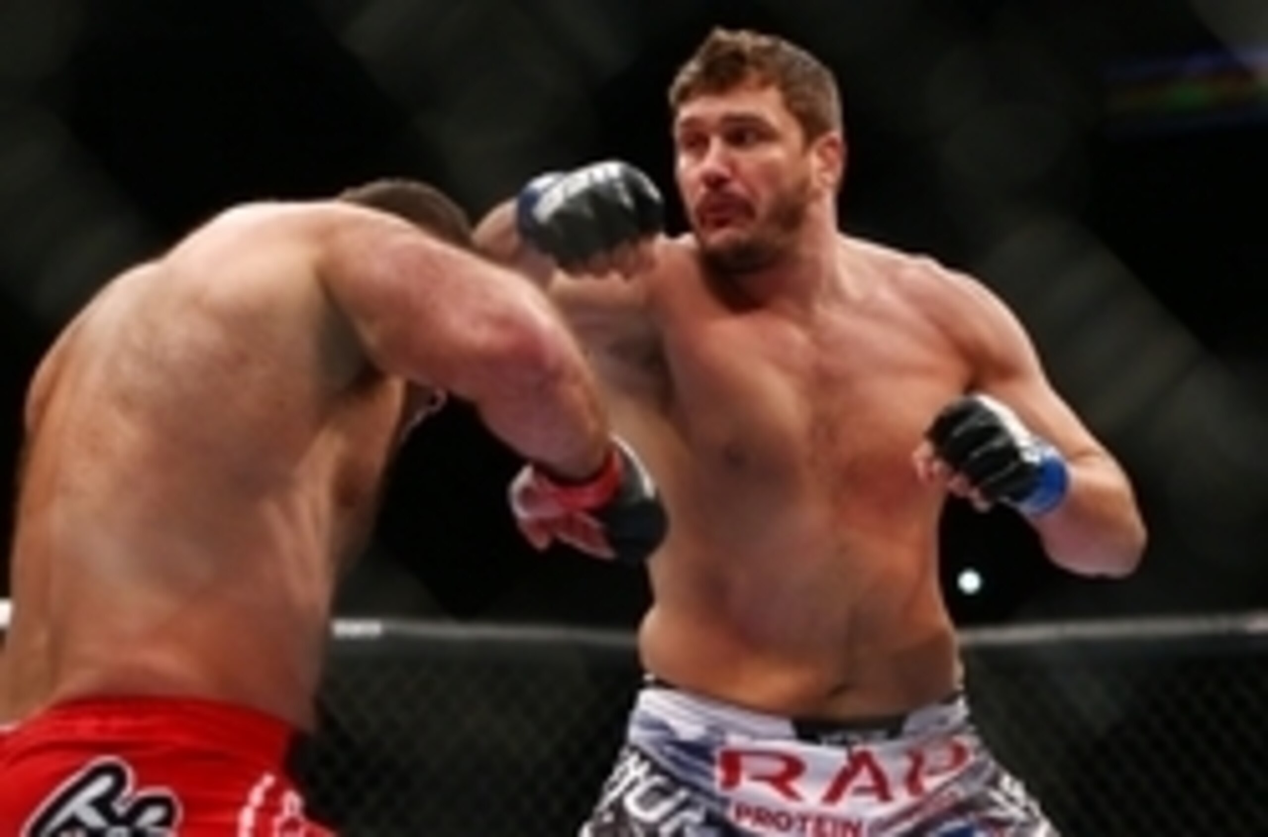 December 13, 2014; Phoenix, AZ, USA; Matt Mitrione hits Gabriel Gonzaga during UFC Fight Night at US Airways Center. Mandatory Credit: Mark J. Rebilas-USA TODAY Sports