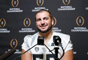 Third-round pick Hroniss Grasu will compete with veteran Will Montgomery for the starting center job.